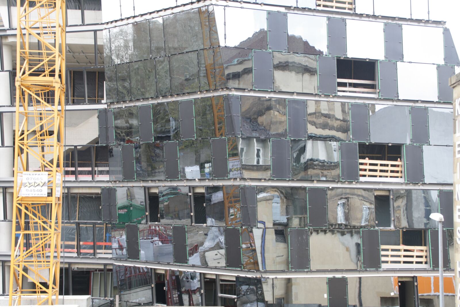 Canon EOS 1000D (EOS Digital Rebel XS / EOS Kiss F) sample photo. Construction site, building, mirror photography