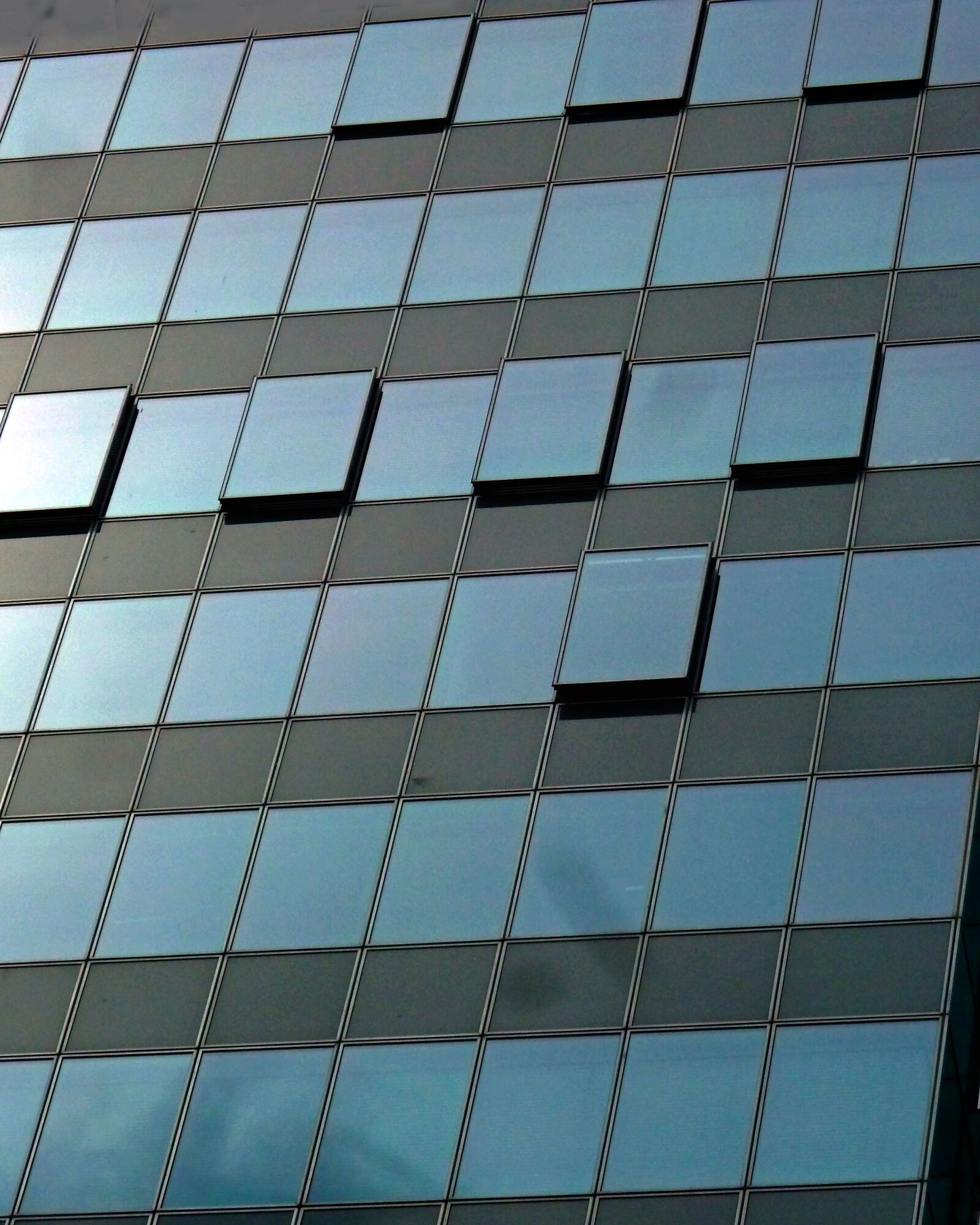 Panasonic DMC-TZ7 sample photo. Skyscraper, glass windows, building photography