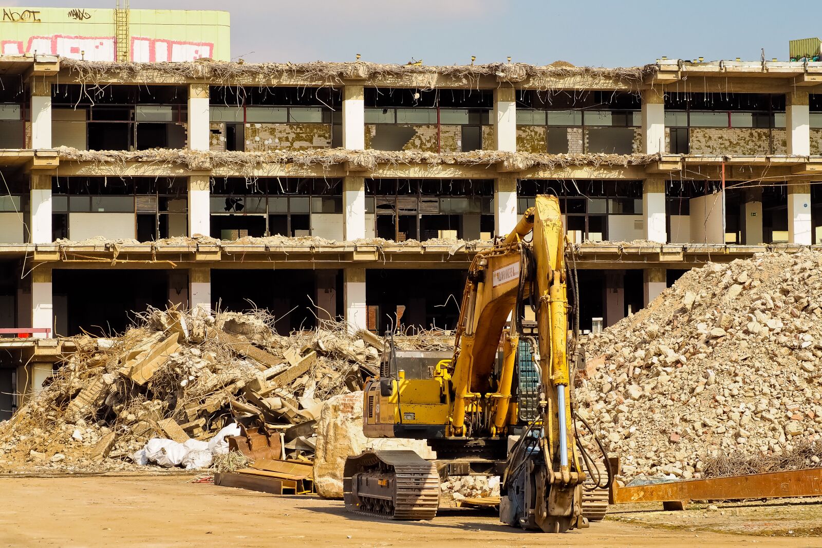 Olympus OM-D E-M10 sample photo. Site, demolition work, demolition photography