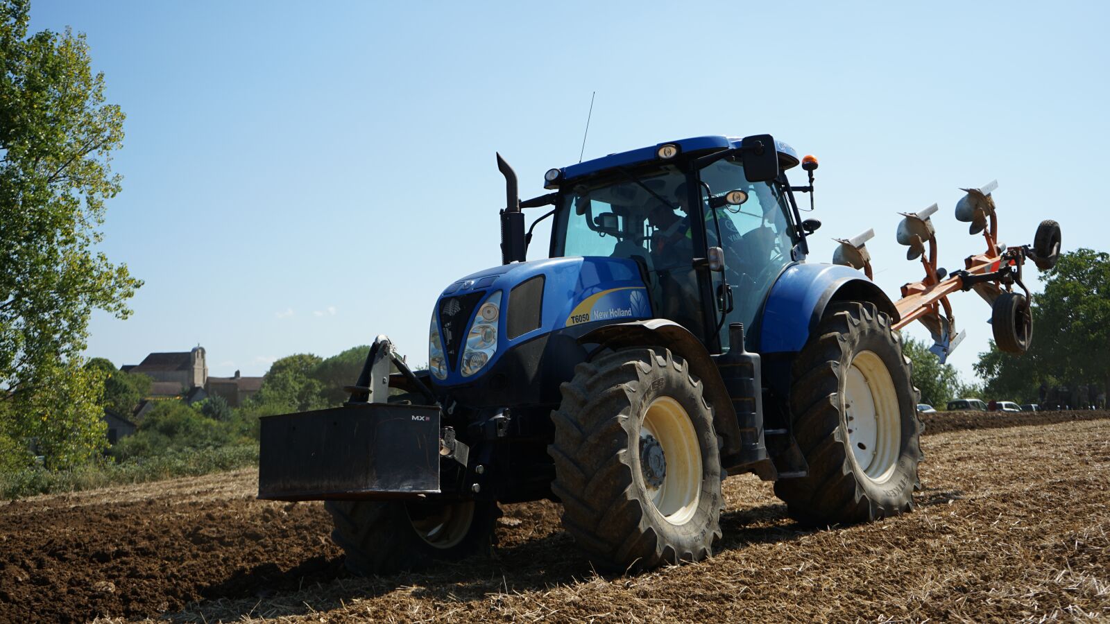 Sony a7 II + Sony FE 28-70mm F3.5-5.6 OSS sample photo. Tractor, earth, field photography