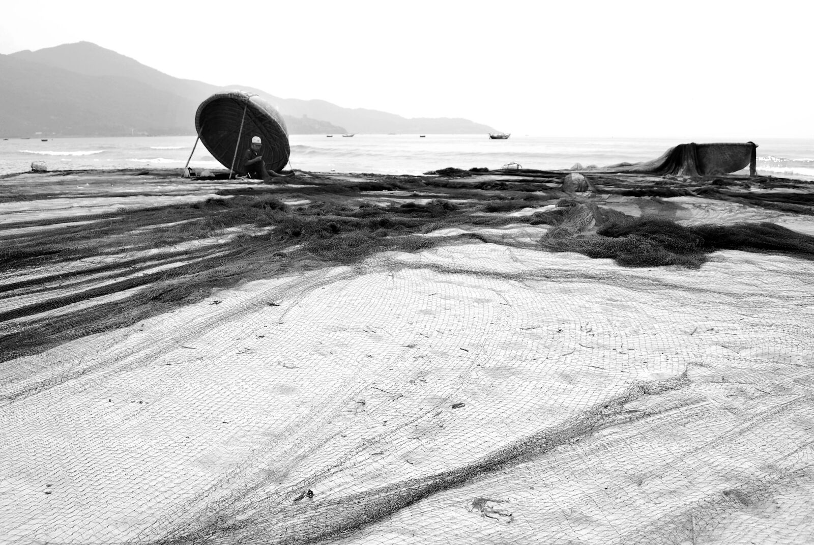 Nikon D60 sample photo. Mending their nets, tongue photography