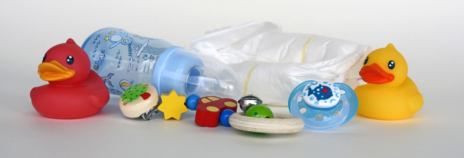Nikon D7100 sample photo. Ducks, toys, baby bottle photography