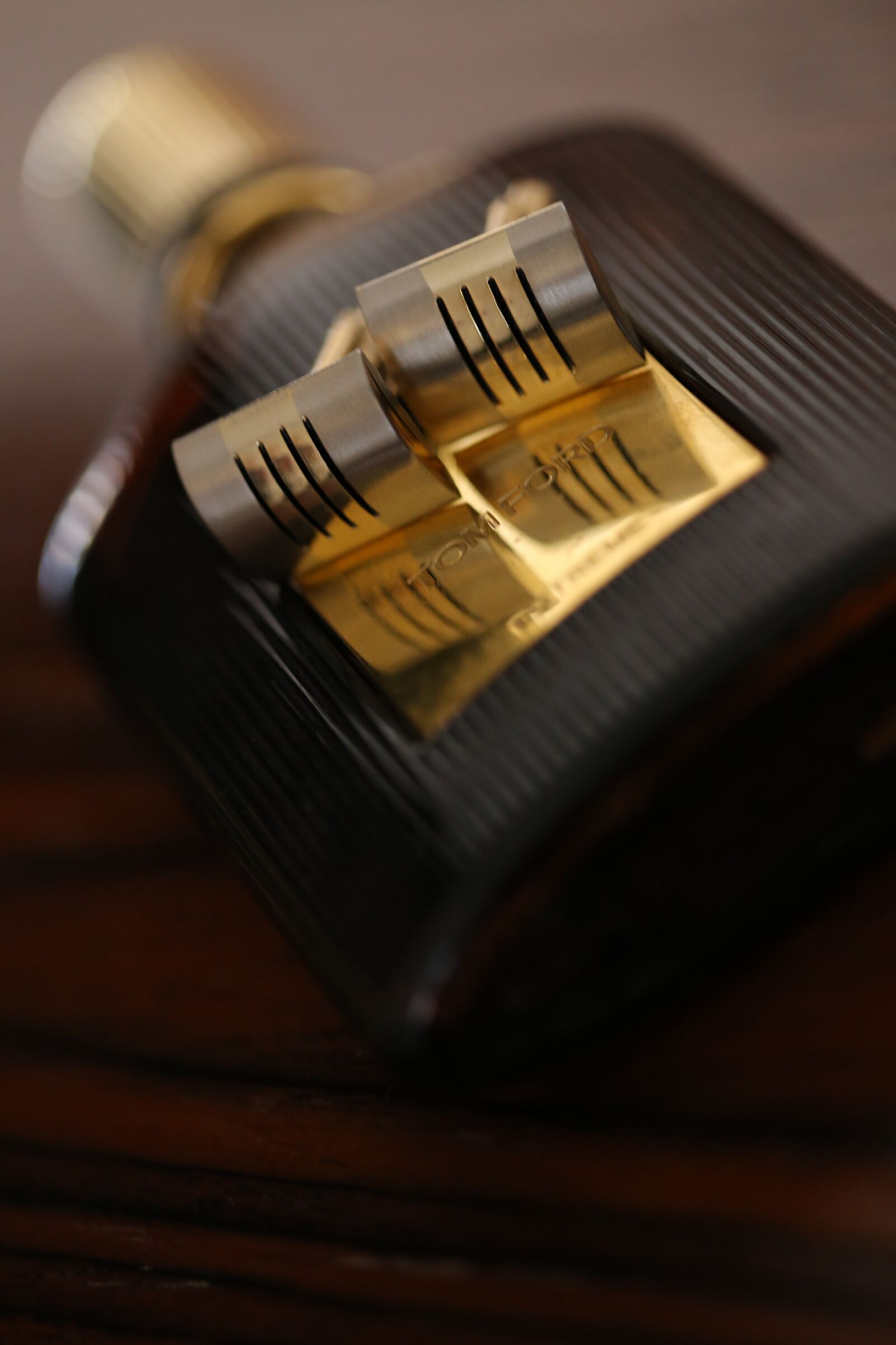 Canon EF 100mm F2.8 Macro USM sample photo. Golden glow, bottle, elegant photography