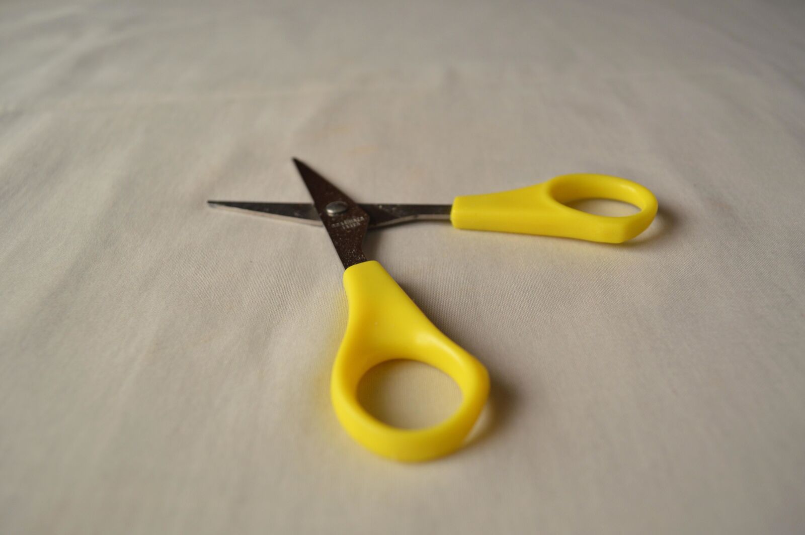 Nikon D3200 sample photo. Yellow, scissors, object, hand photography