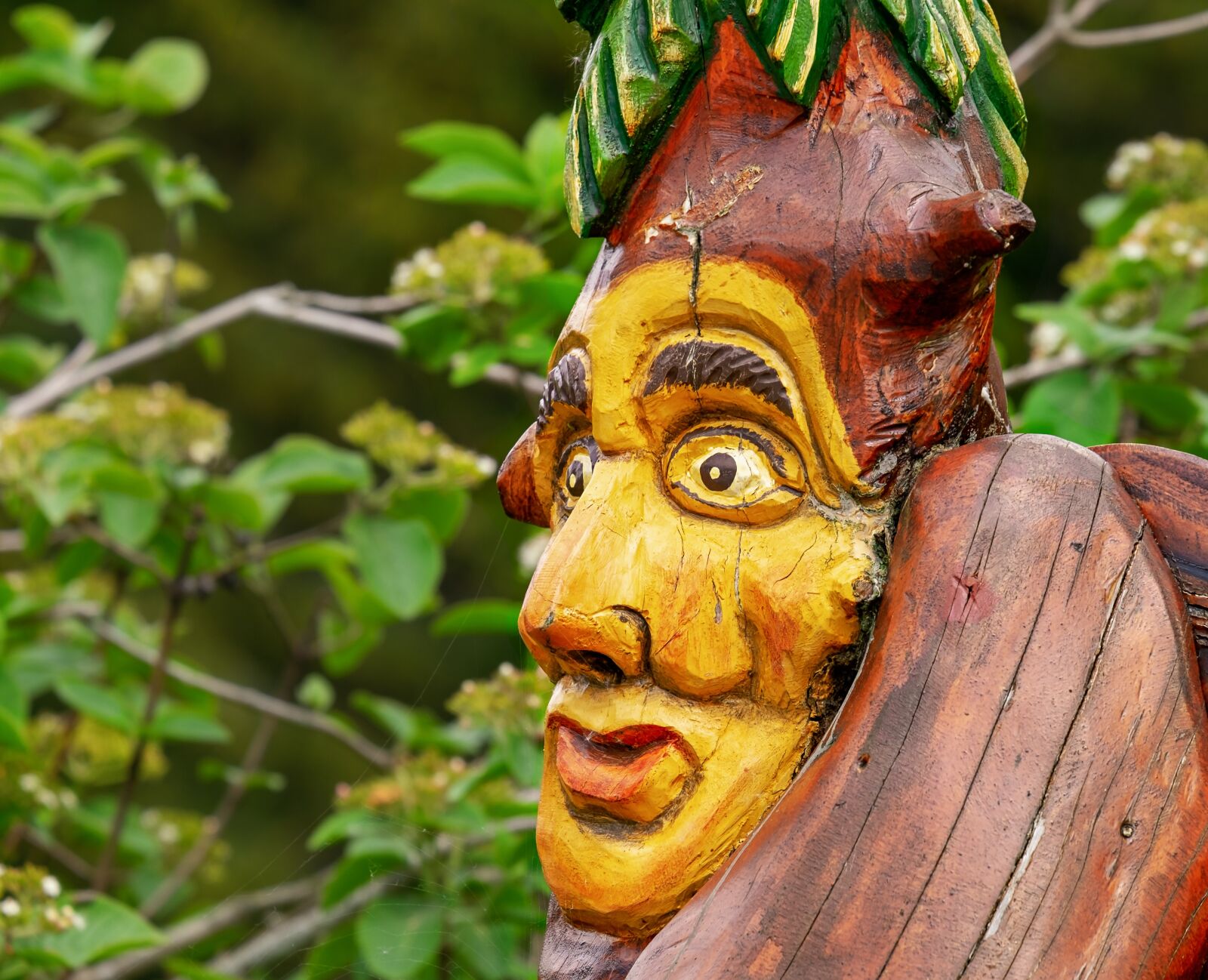 Fujifilm XF 55-200mm F3.5-4.8 R LM OIS sample photo. Sculpture, wood, face photography