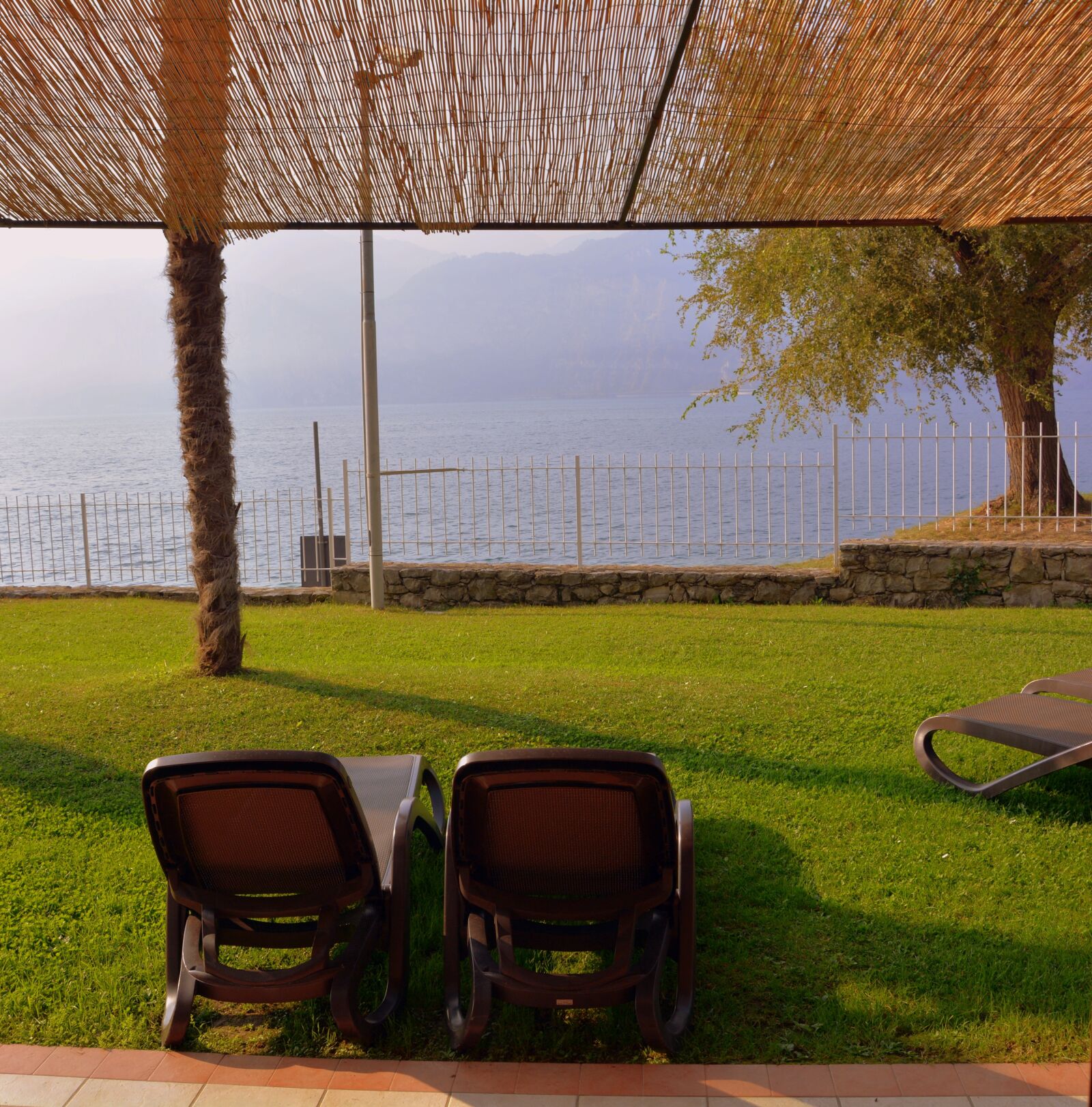 Nikon D7100 sample photo. Garden, lake, chairs photography