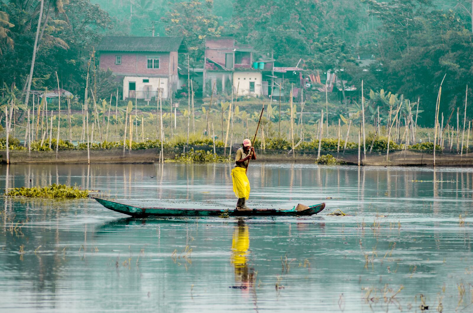 Nikon D5100 sample photo. Fisherman, boat, water photography
