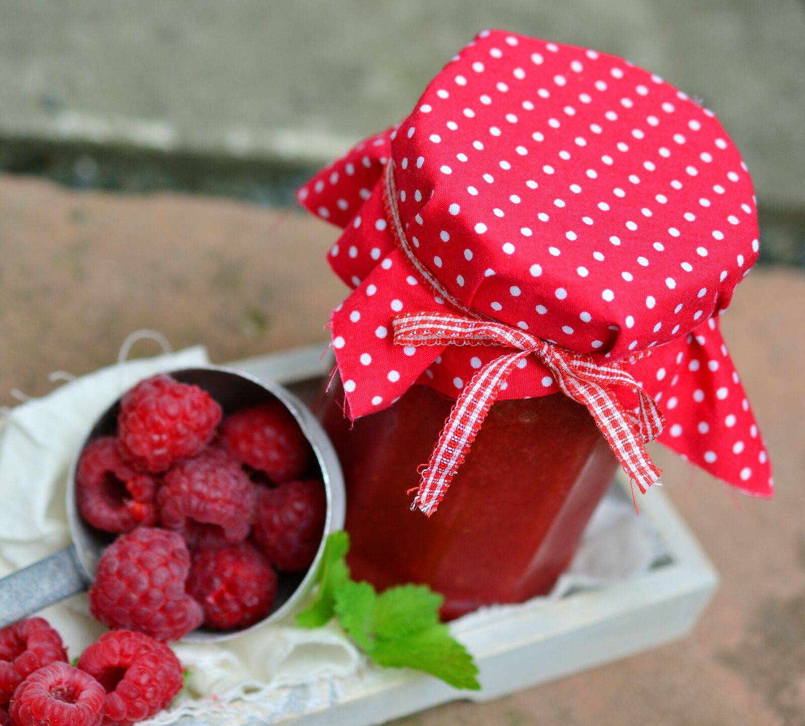 Nikon D5200 sample photo. Jar of jam, raspberries photography
