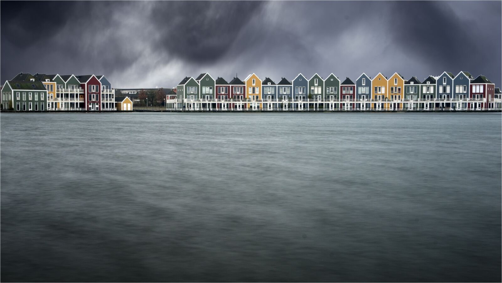 Sony 70-300mm F4.5-5.6 G SSM sample photo. Storm, cottages wooden, netherlands photography