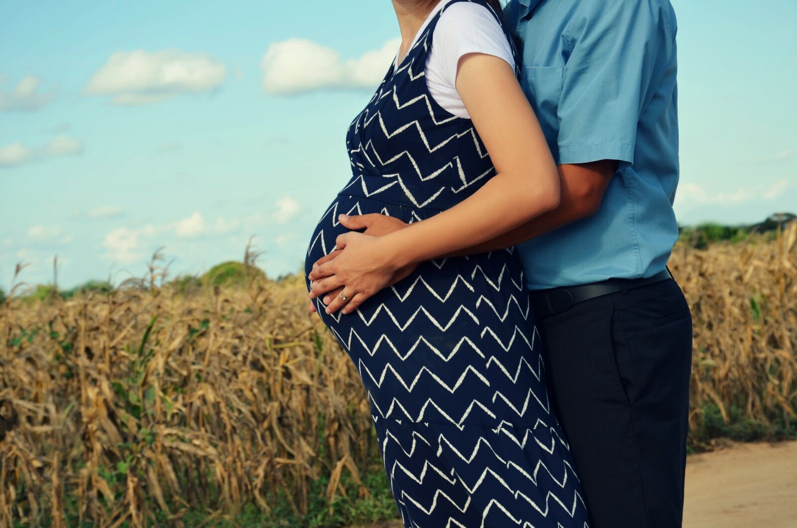Nikon D7000 sample photo. Pregnancy, couple, family photography