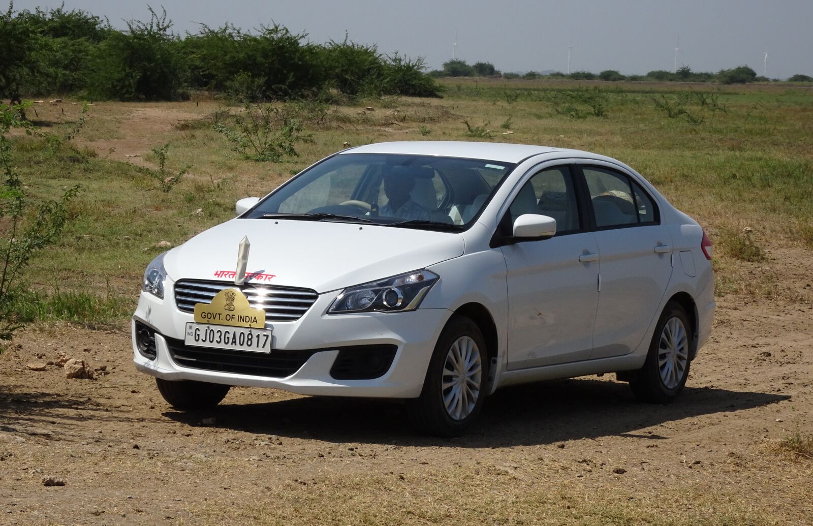 Sony Cyber-shot DSC-HX90V sample photo. Car, suzuki, sedan photography