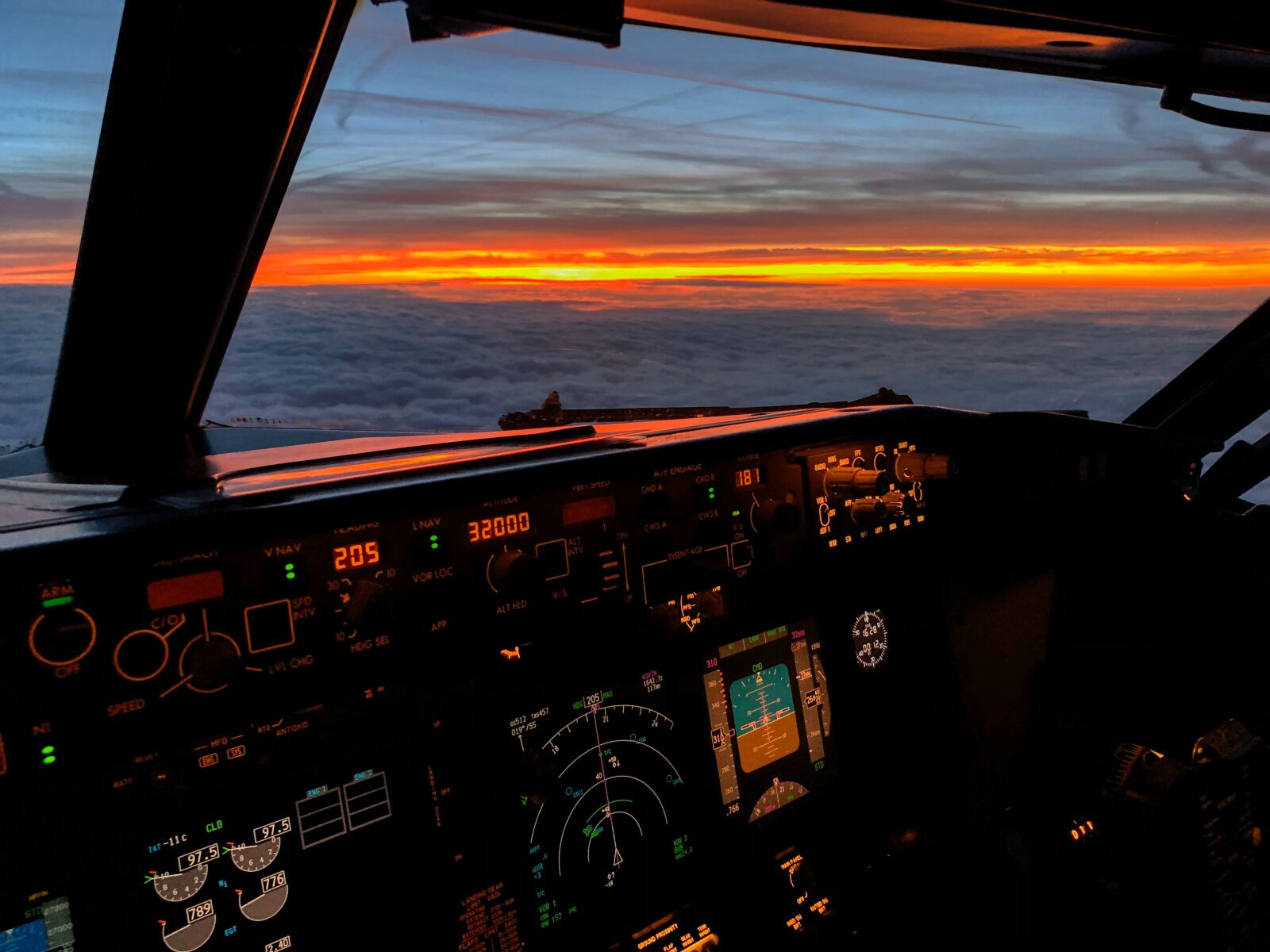 iPhone X back dual camera 4mm f/1.8 sample photo. Sunset, flight deck, sky photography