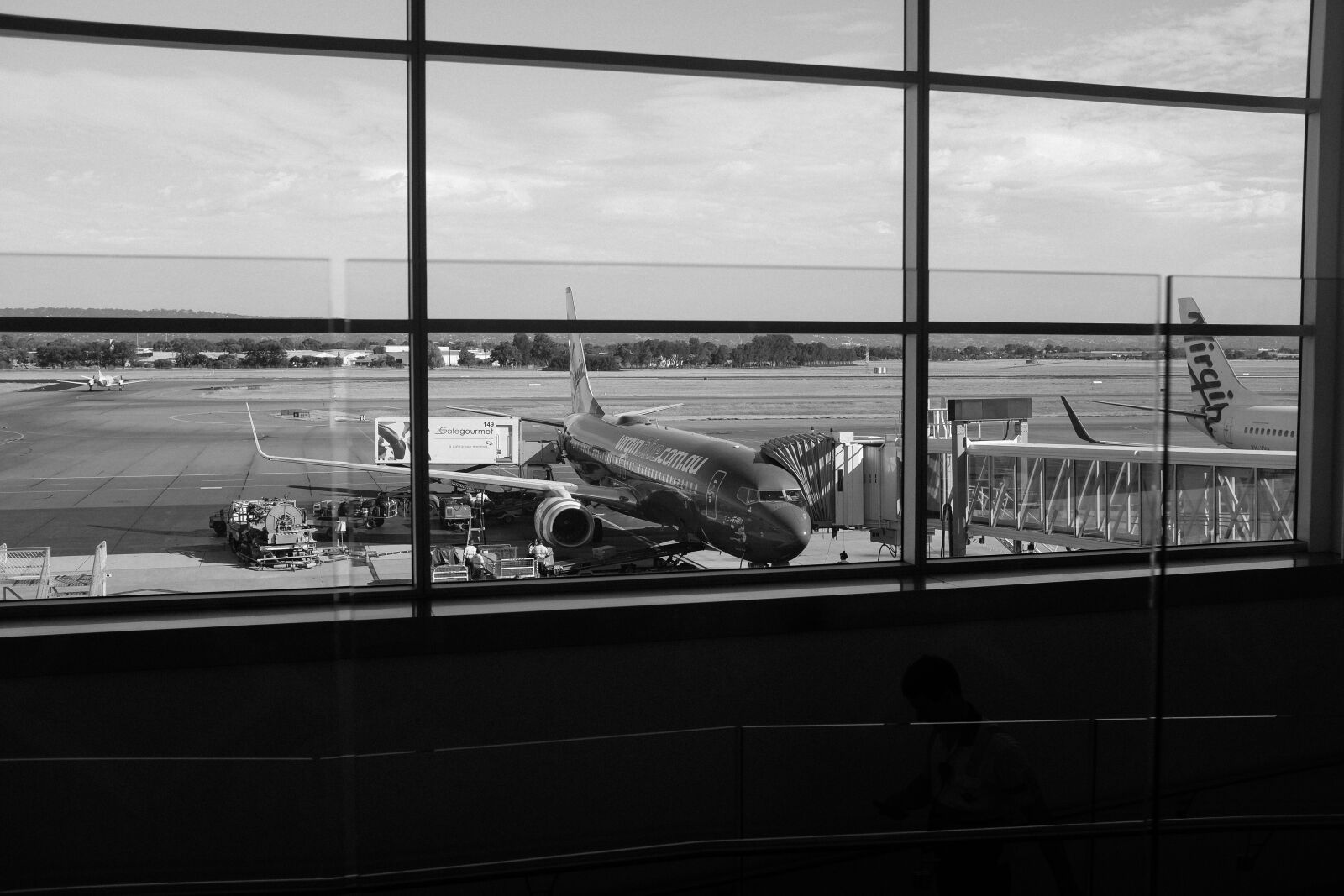 Fujifilm X100S sample photo. Airport, black, and, white photography