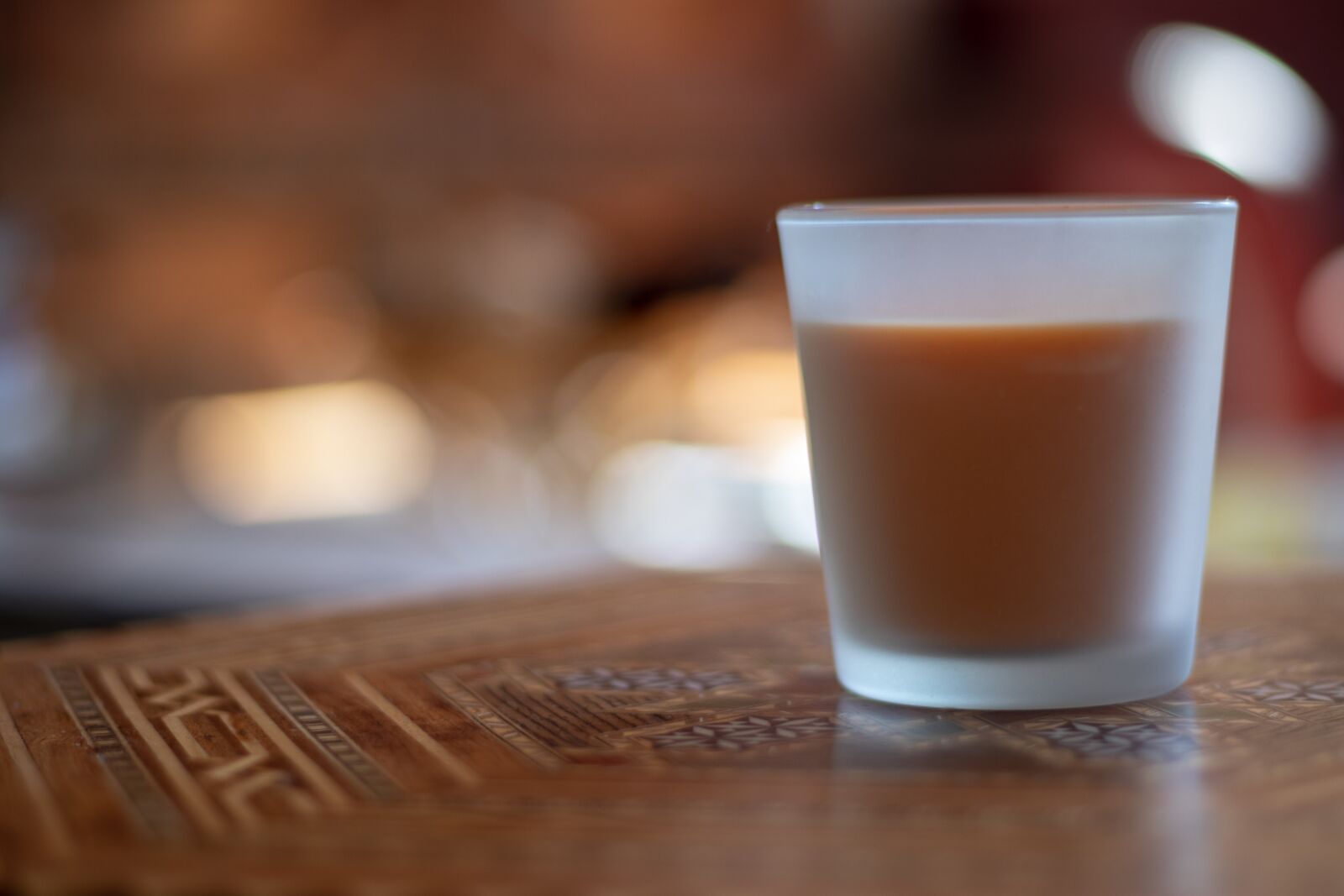 Canon EOS 200D (EOS Rebel SL2 / EOS Kiss X9) + Canon EF 50mm F1.8 STM sample photo. Candle, table, orange photography