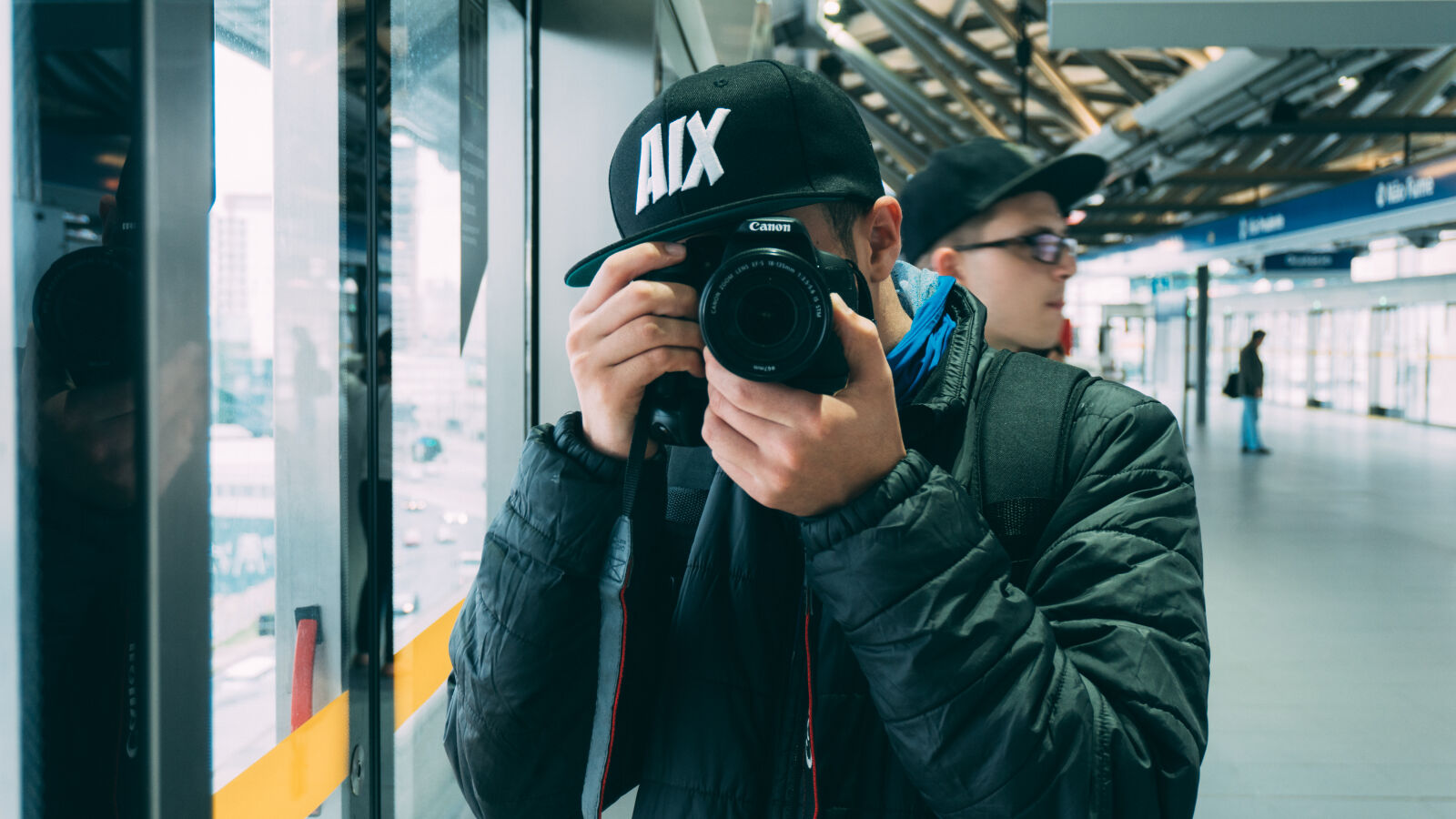 Sony a6300 sample photo. Adults, blur, camera, indoors photography