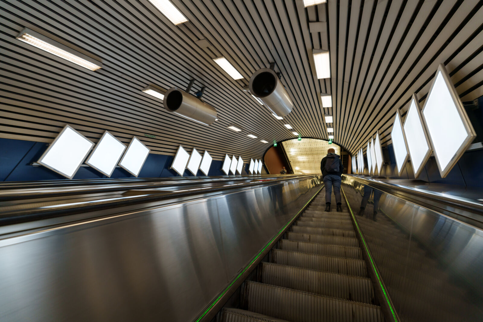 Sony a7R V sample photo. Escalator commuting distortion photography