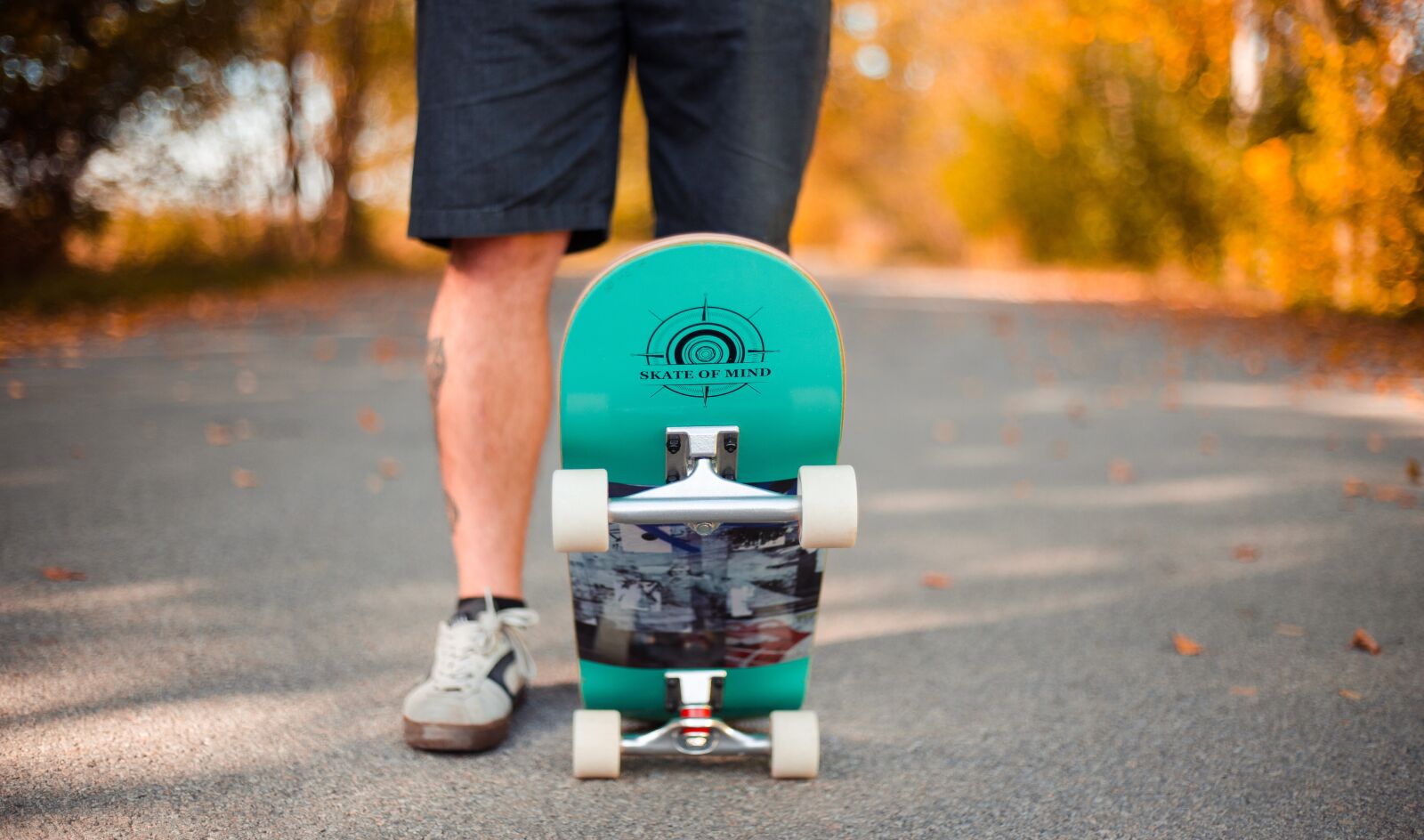 Canon EF 50mm F1.8 II sample photo. Skateboard, man, autumn photography