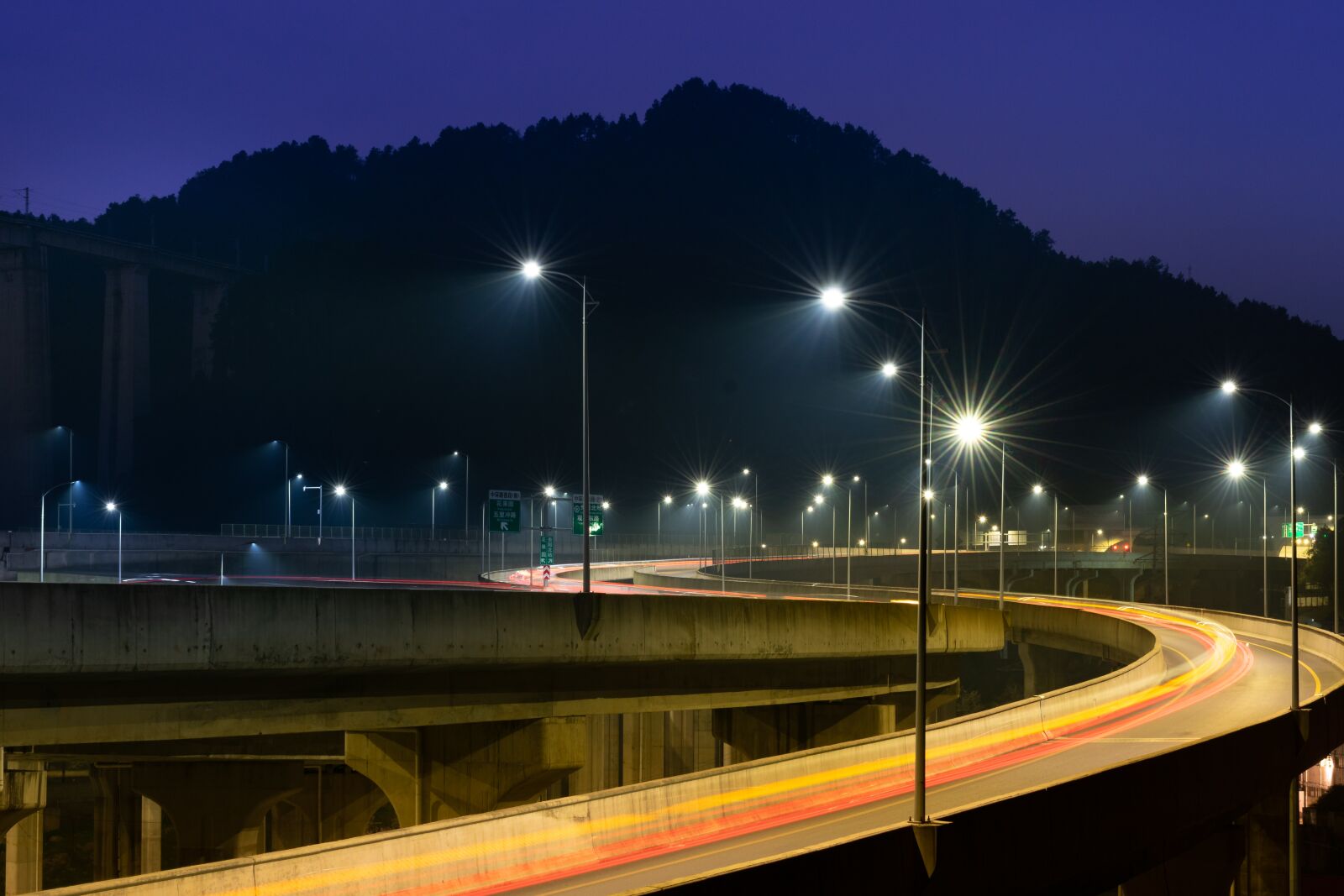 Nikon D3400 sample photo. Street lamp, tracks, mountain photography