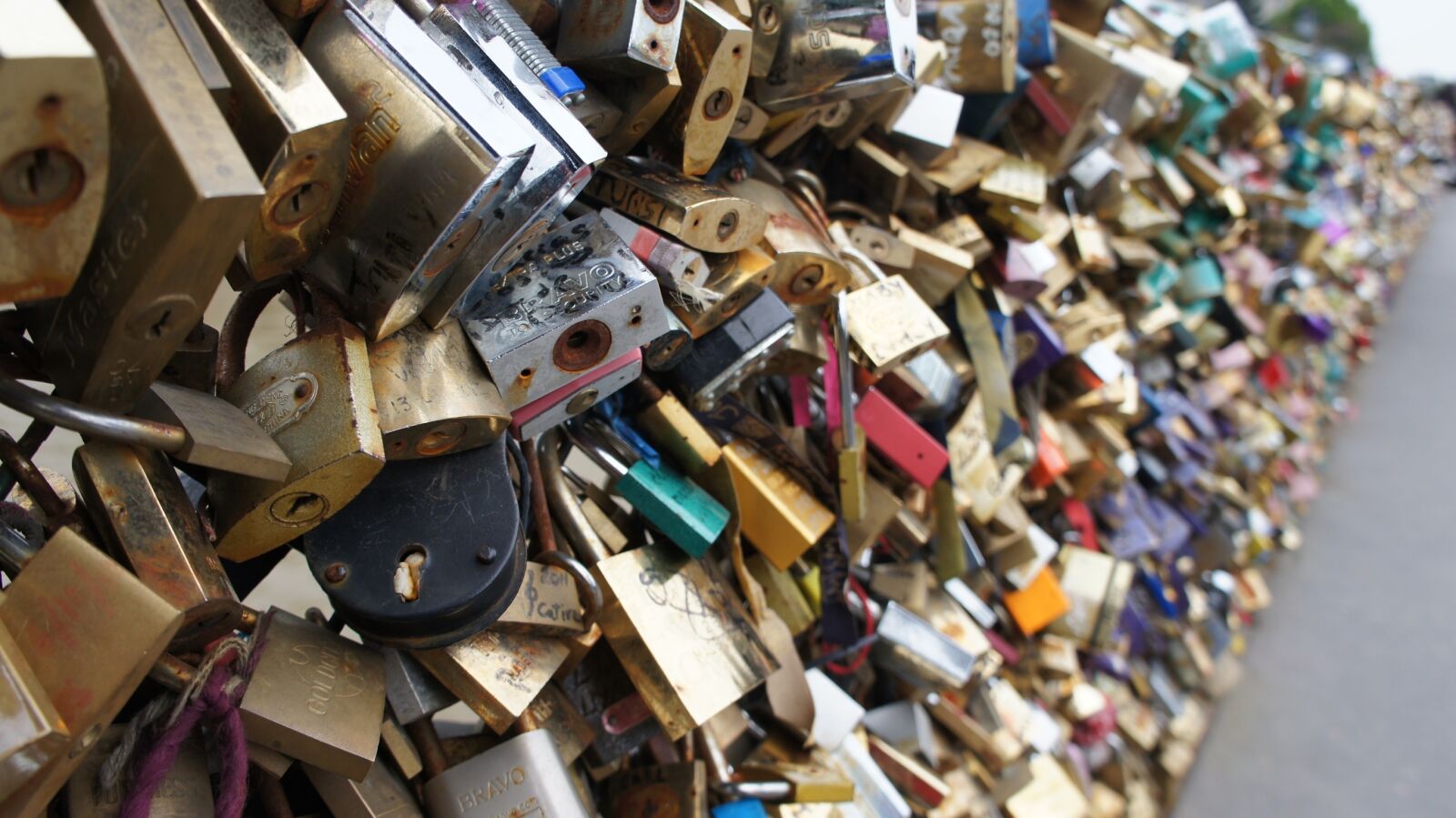 Sony E 18-55mm F3.5-5.6 OSS sample photo. Bridge, france, locks, love photography