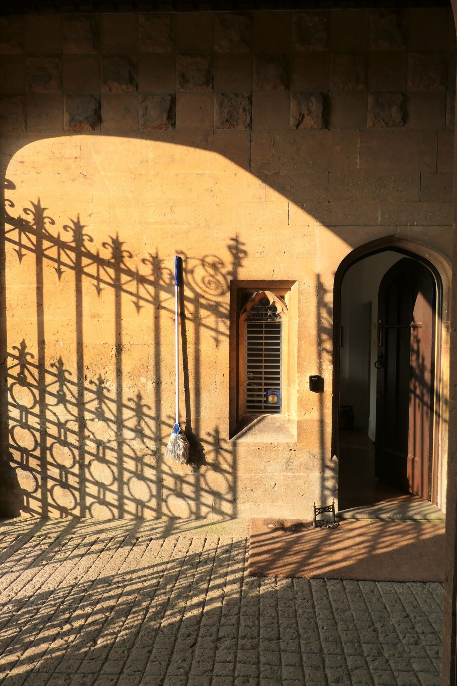 Panasonic DC-TZ200 sample photo. Sudeley castle gatehouse, shadows photography