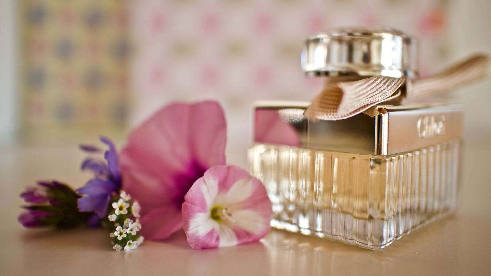 Canon EOS M + Canon EF-M 22mm F2 STM sample photo. Perfume, glass bottle, fragrance photography