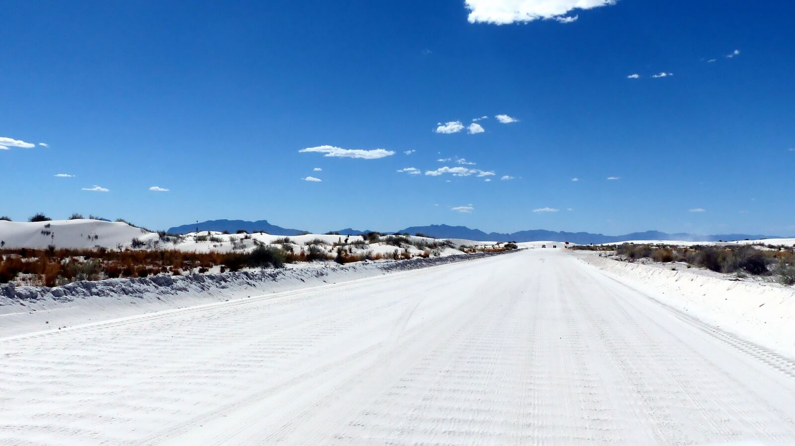 Panasonic Lumix DMC-FZ200 sample photo. Desert, road cover in photography