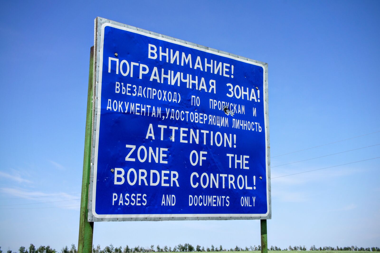 Sony Alpha NEX-5 + Sony E 18-55mm F3.5-5.6 OSS sample photo. Border, cross shield, kazakhstan photography