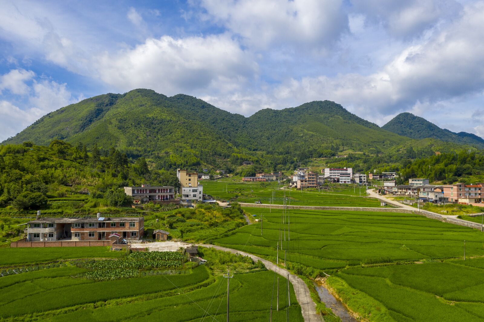 Hasselblad L1D-20c sample photo. Aerial, village, clouds photography