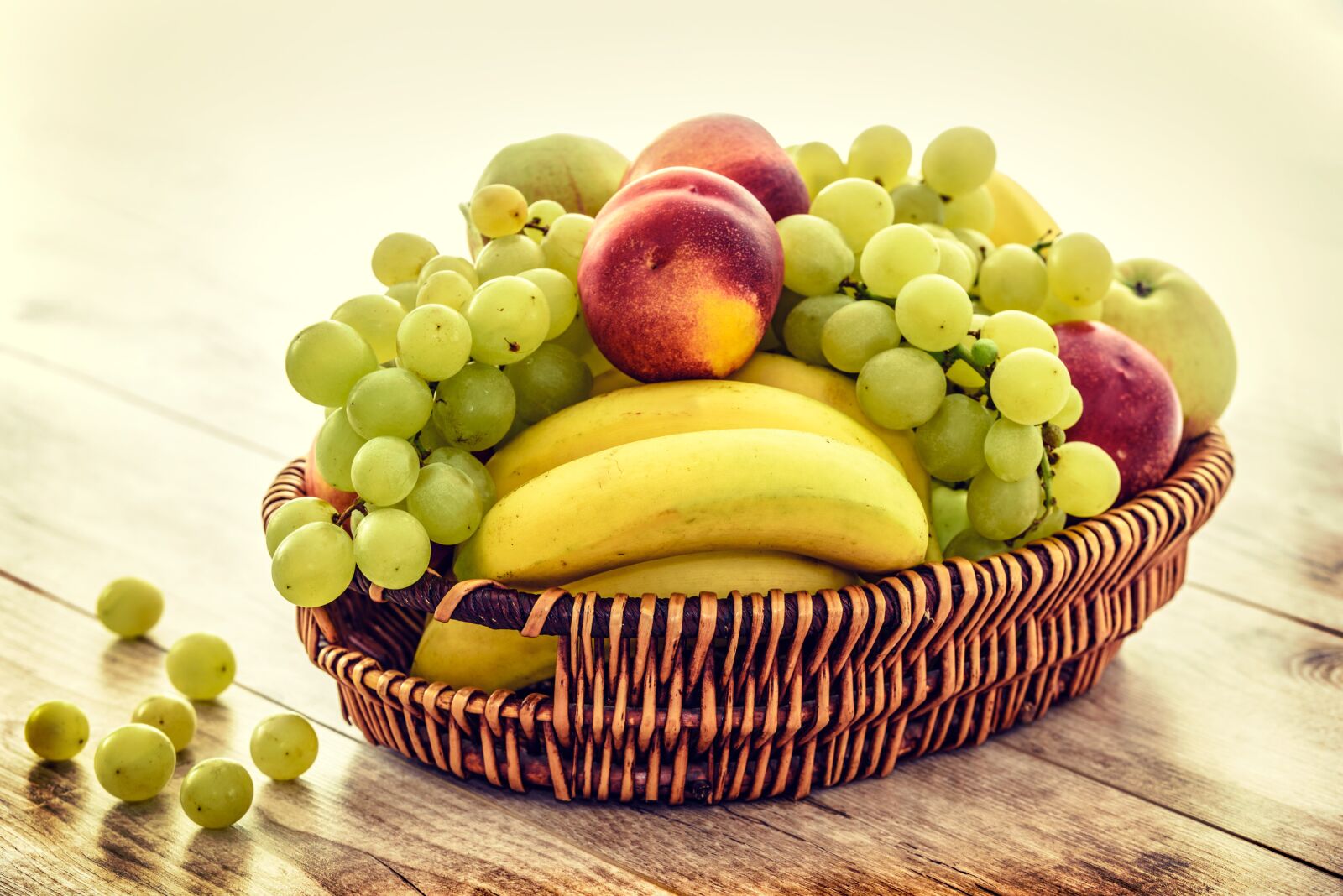 Nikon D750 sample photo. Fruit basket, bananas, grapes photography