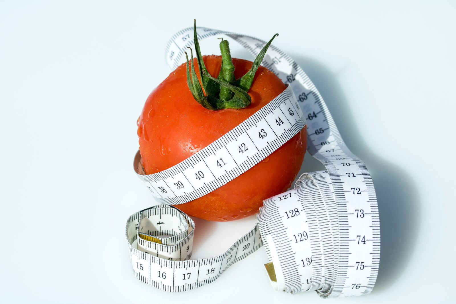 Canon EF-S 60mm F2.8 Macro USM sample photo. Tape measure, tomato, wrapped photography
