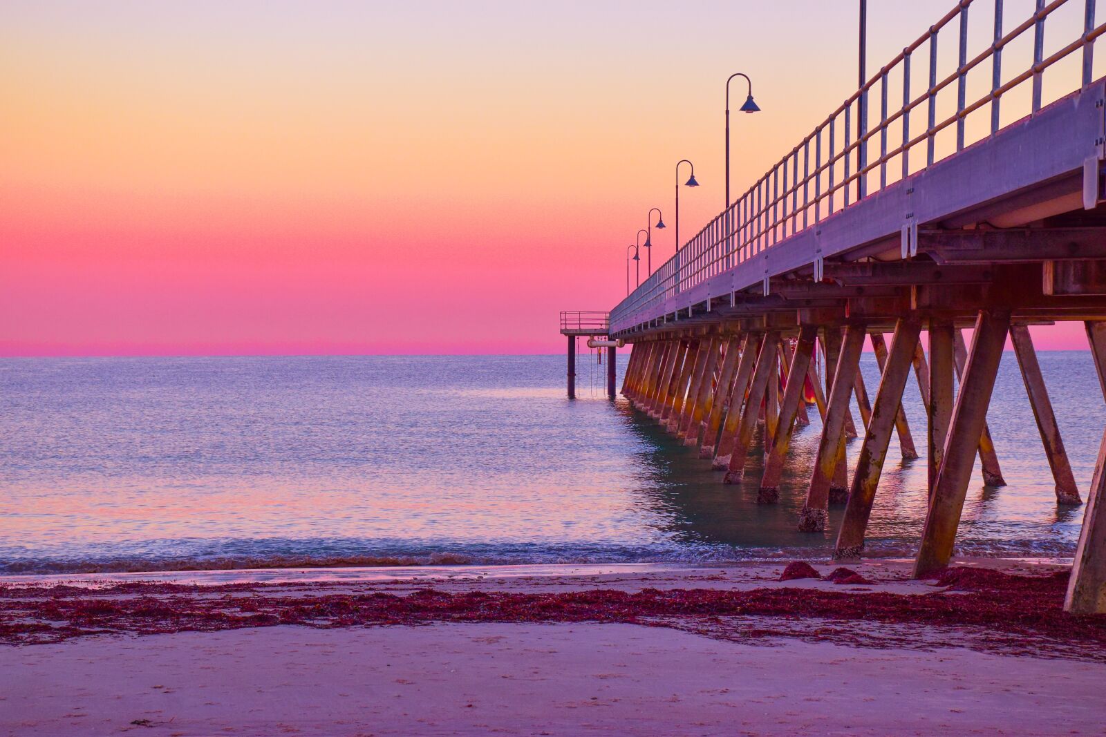 Nikon D5600 sample photo. Jetty, beach, sunset photography