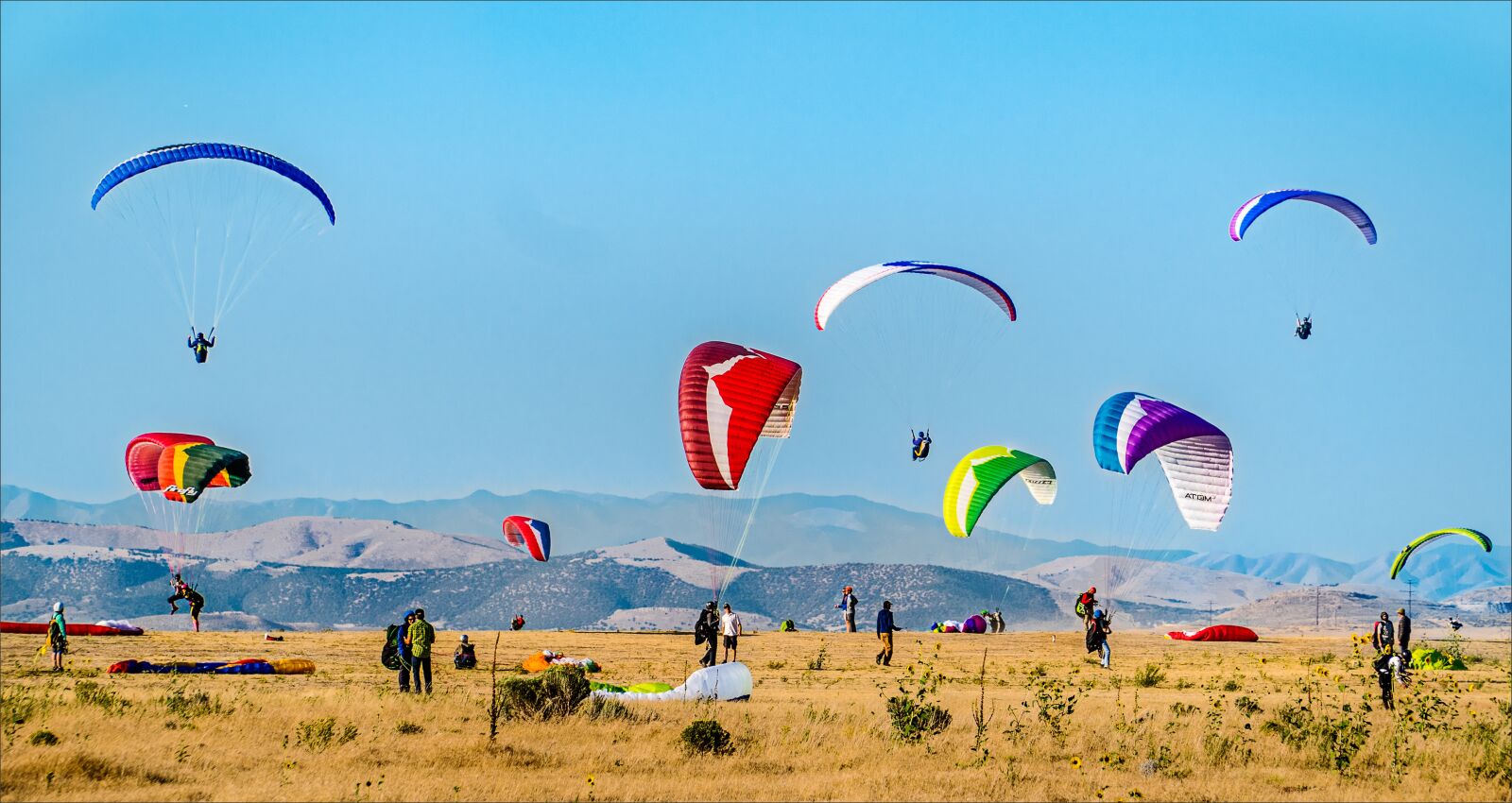 Sony E PZ 18-105mm F4 G OSS sample photo. Parachute, sky, air photography