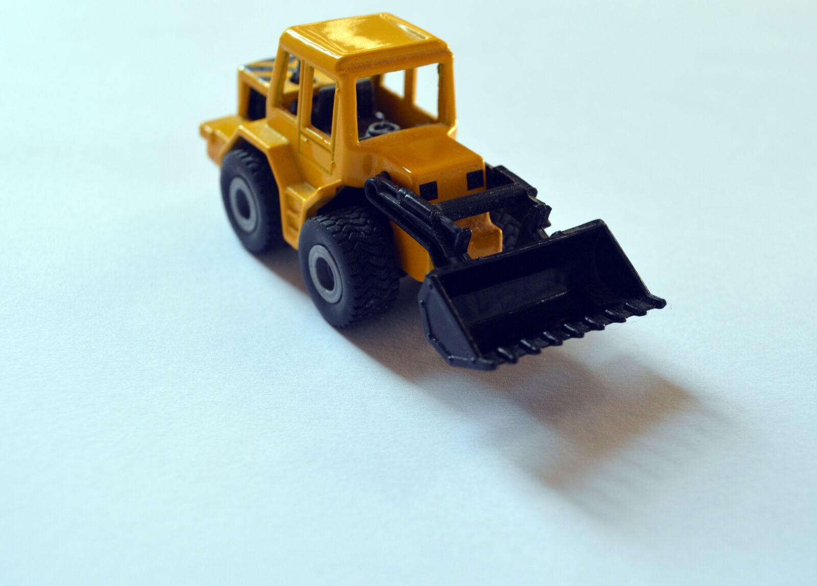 Nikon D3200 sample photo. Backhoe, backhoe loader, toy photography