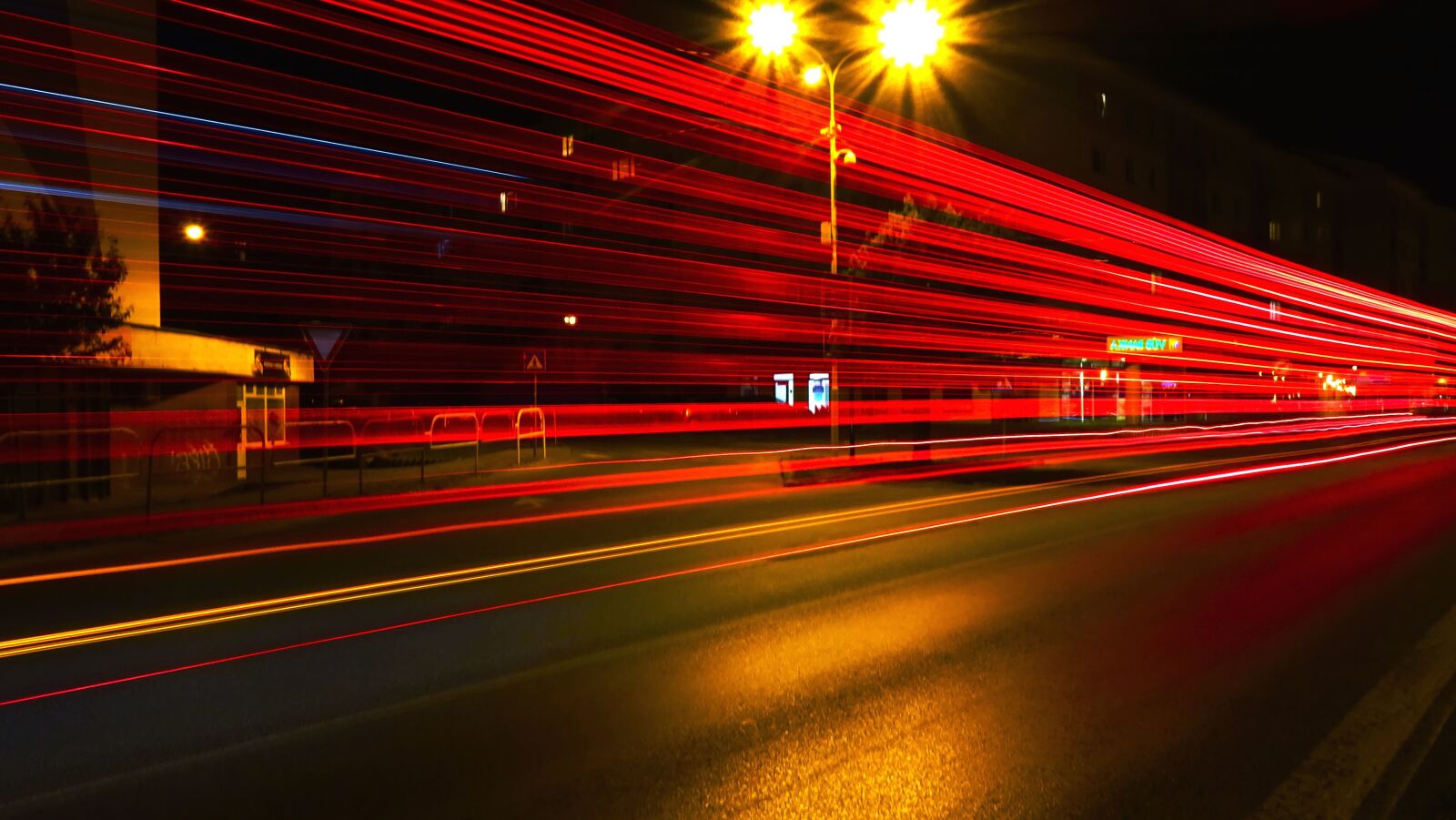 Sony DSC-HX60 sample photo. Modern, motion, night, road photography