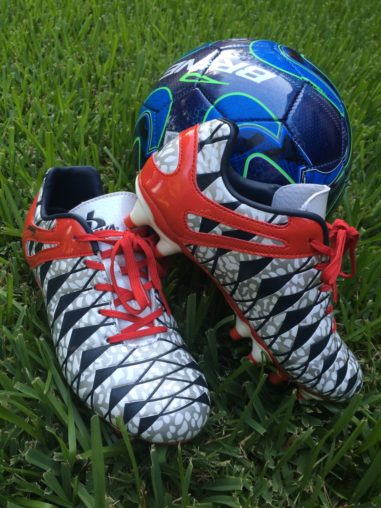 Apple iPhone 5s sample photo. Cleats, field, kids, pitch photography
