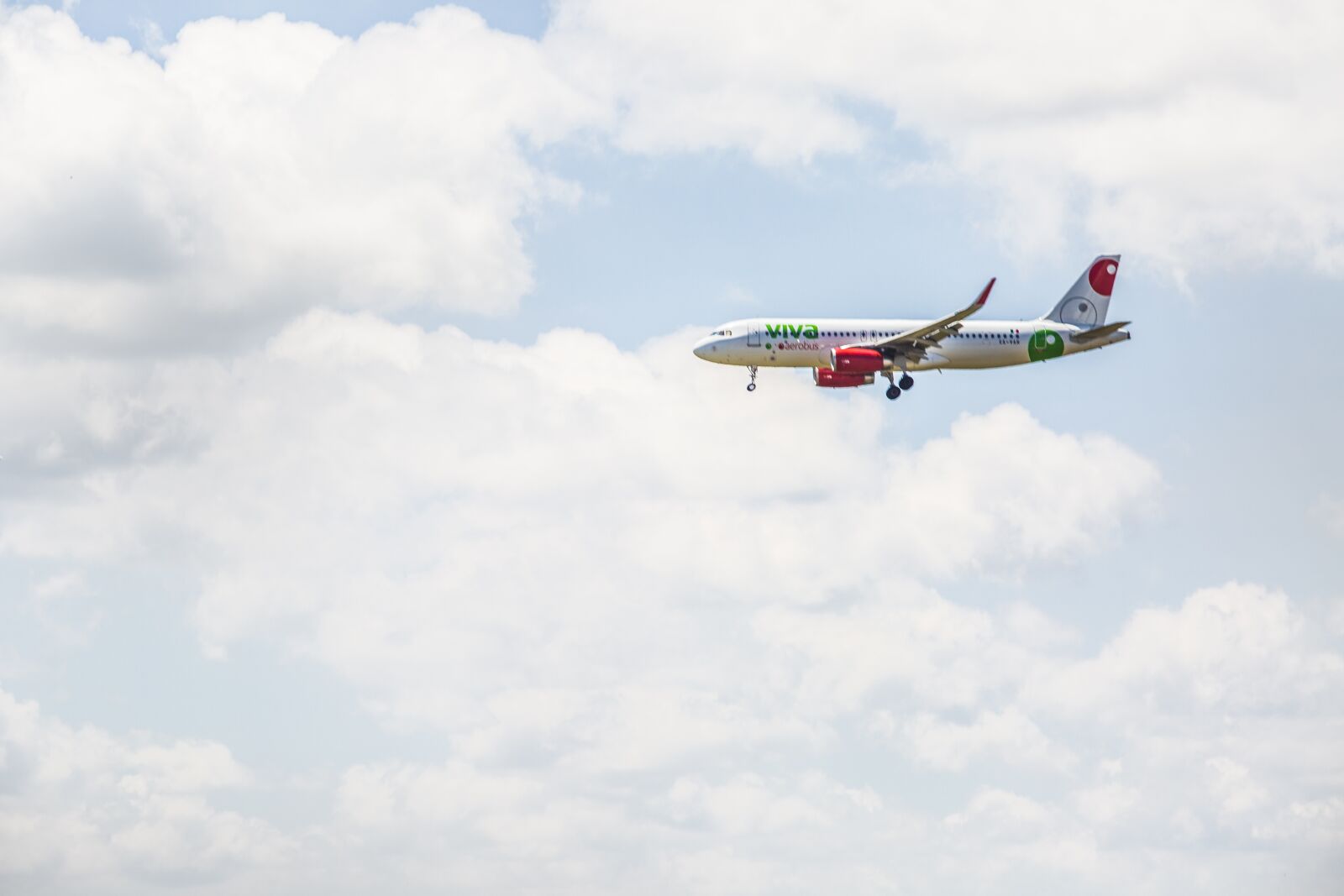 Canon EF 70-200mm F2.8L USM sample photo. Plane, clouds, sky photography