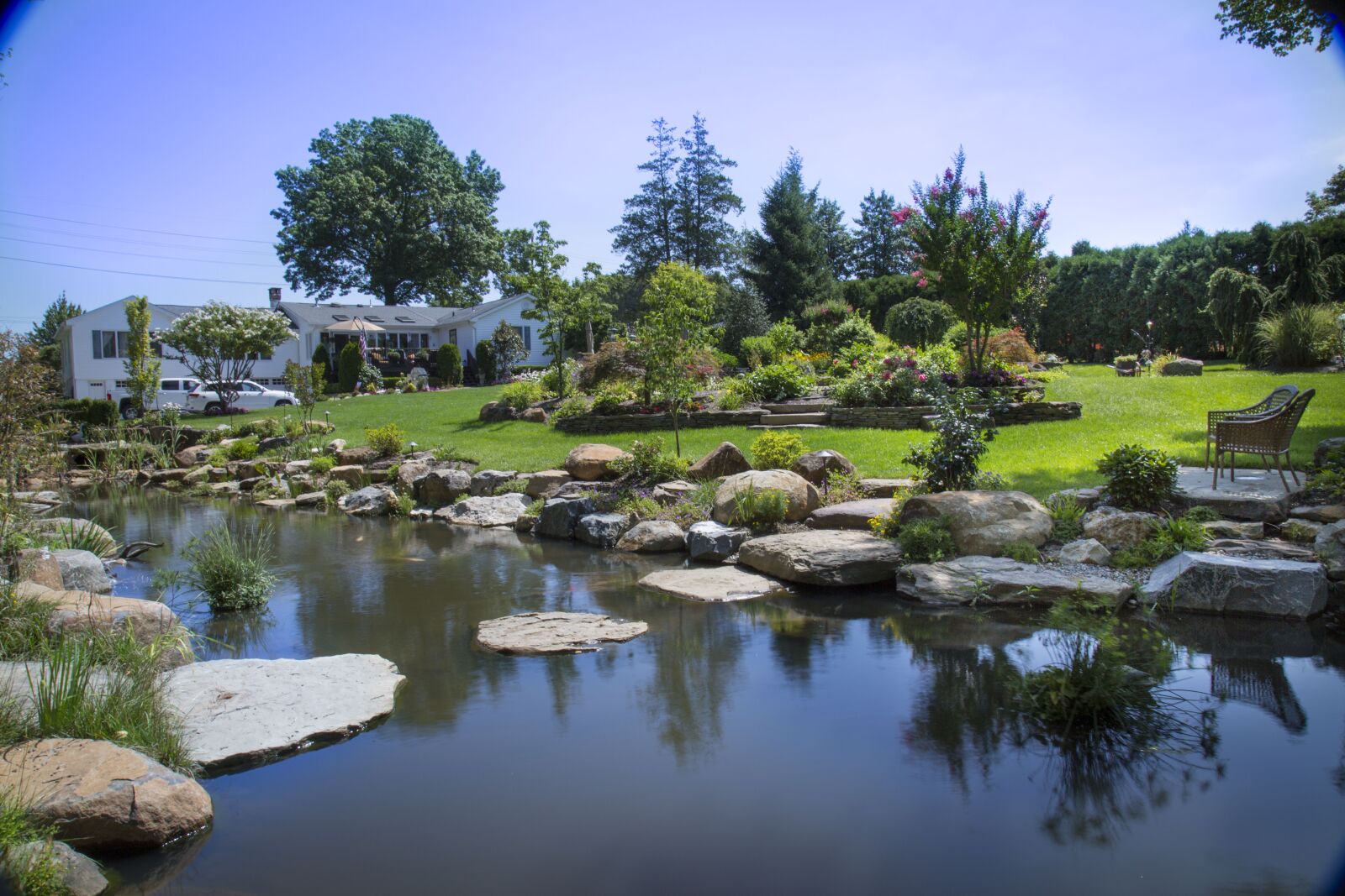 Canon EF 24-105mm F4L IS USM sample photo. Natural pond, stepping stones photography