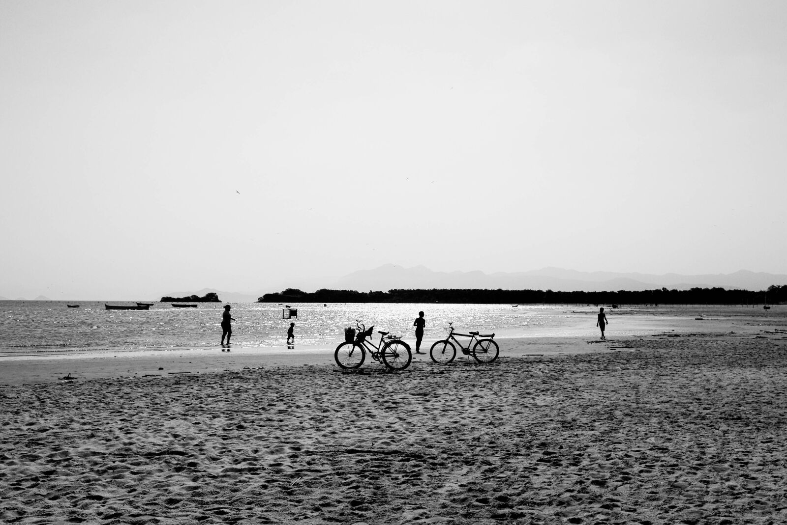 Nikon D3100 sample photo. Bike, people, silhouette photography