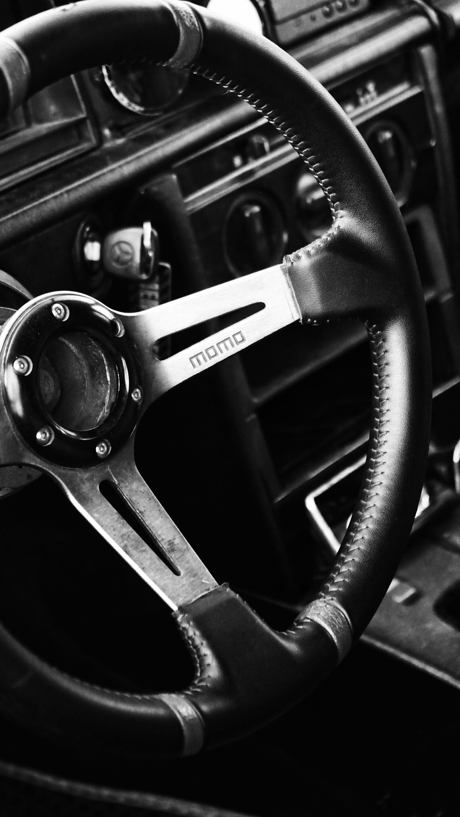 Sony Vario-Tessar T* E 16-70mm F4 ZA OSS sample photo. Steering wheel, auto, machine photography