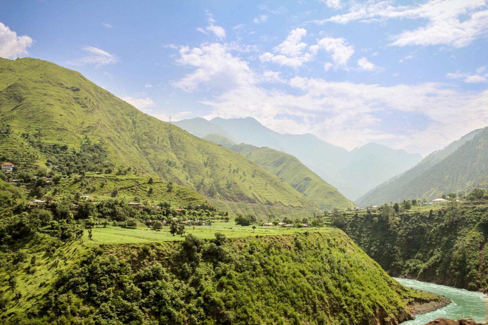 Canon EOS 60D sample photo. Green, valley, with, wending photography