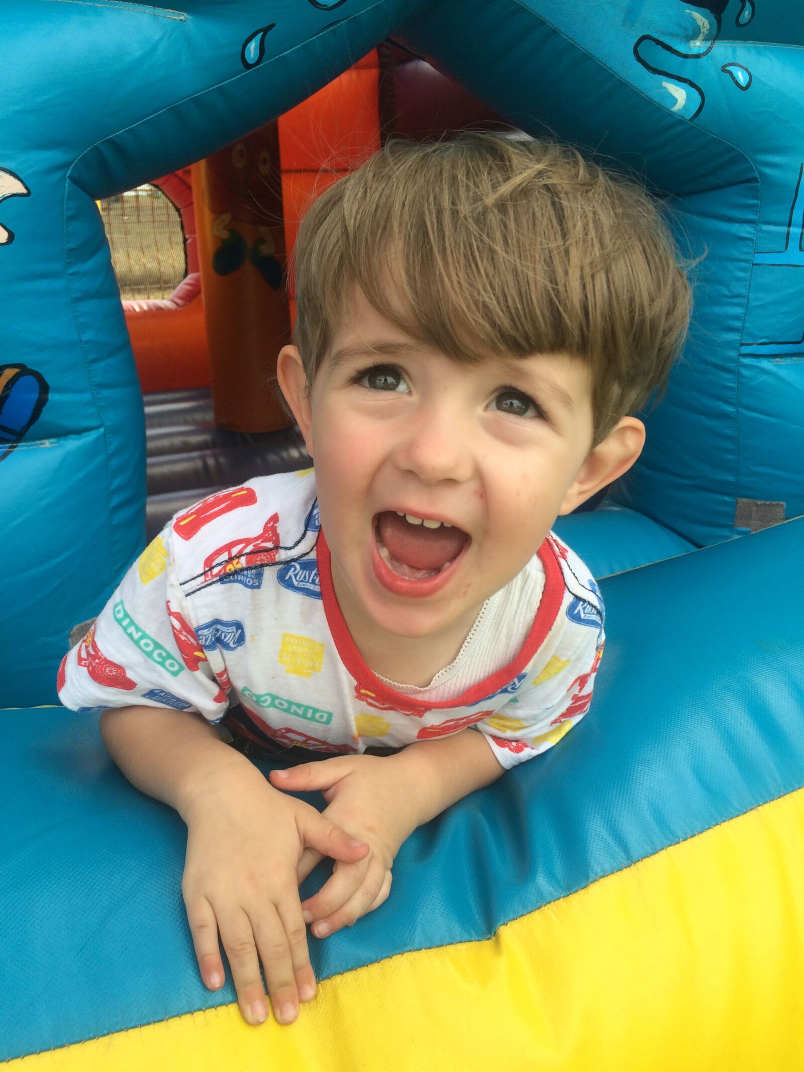 Apple iPhone 5s sample photo. Boy, jumping castle, castle photography