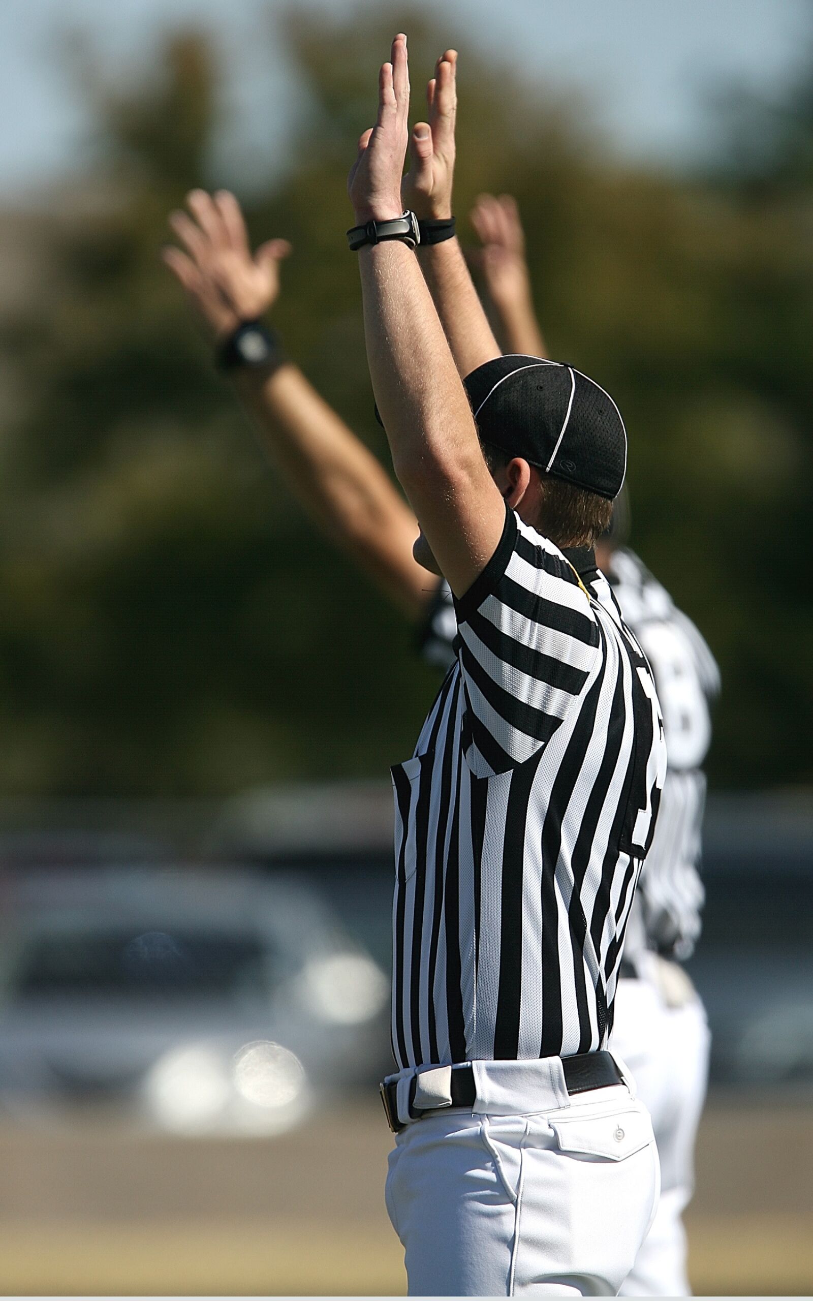 Canon EOS-1D Mark II N sample photo. American football, football officials photography