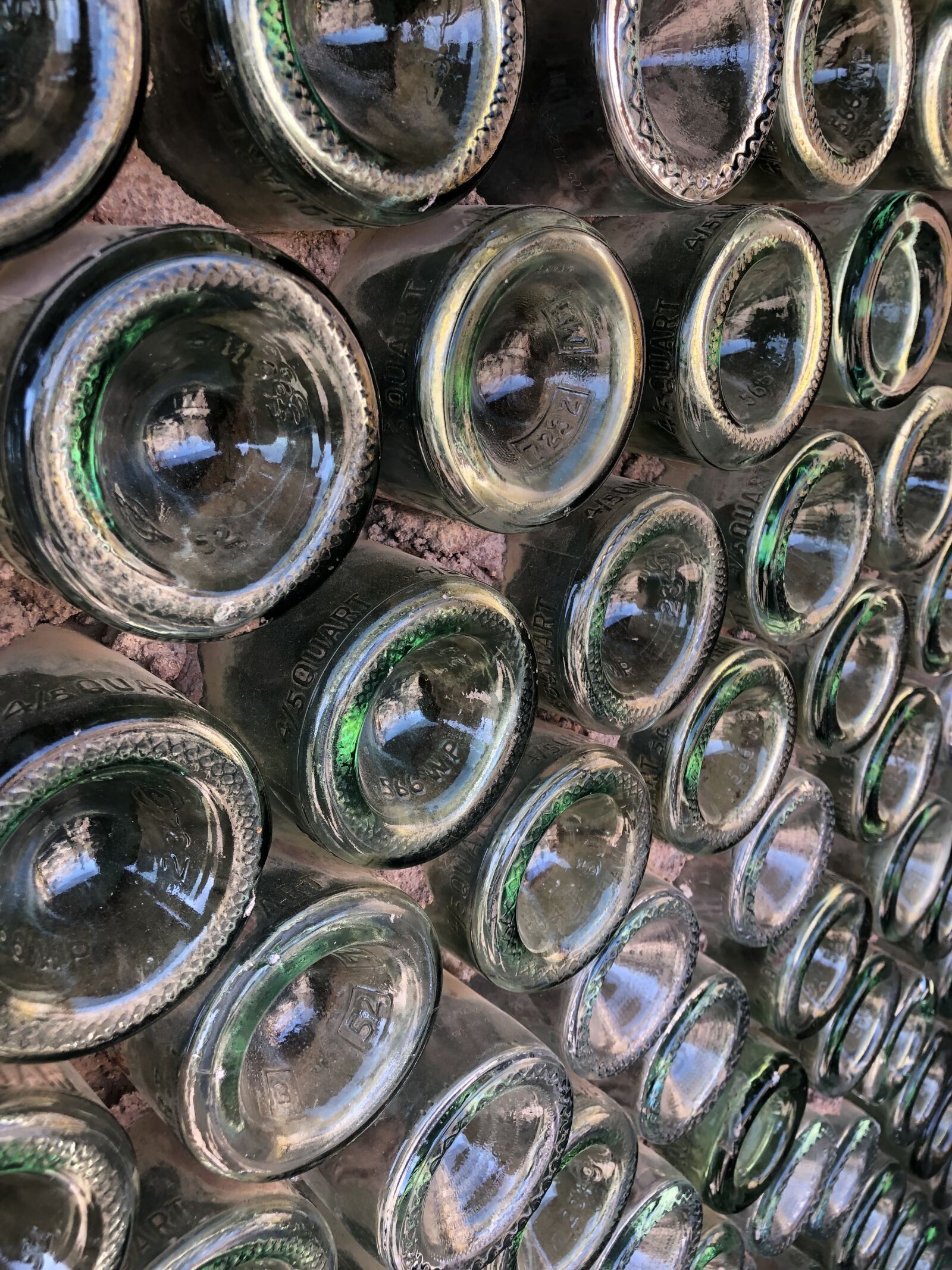 iPhone 8 Plus back dual camera 3.99mm f/1.8 sample photo. Bottles, circular, geometric photography