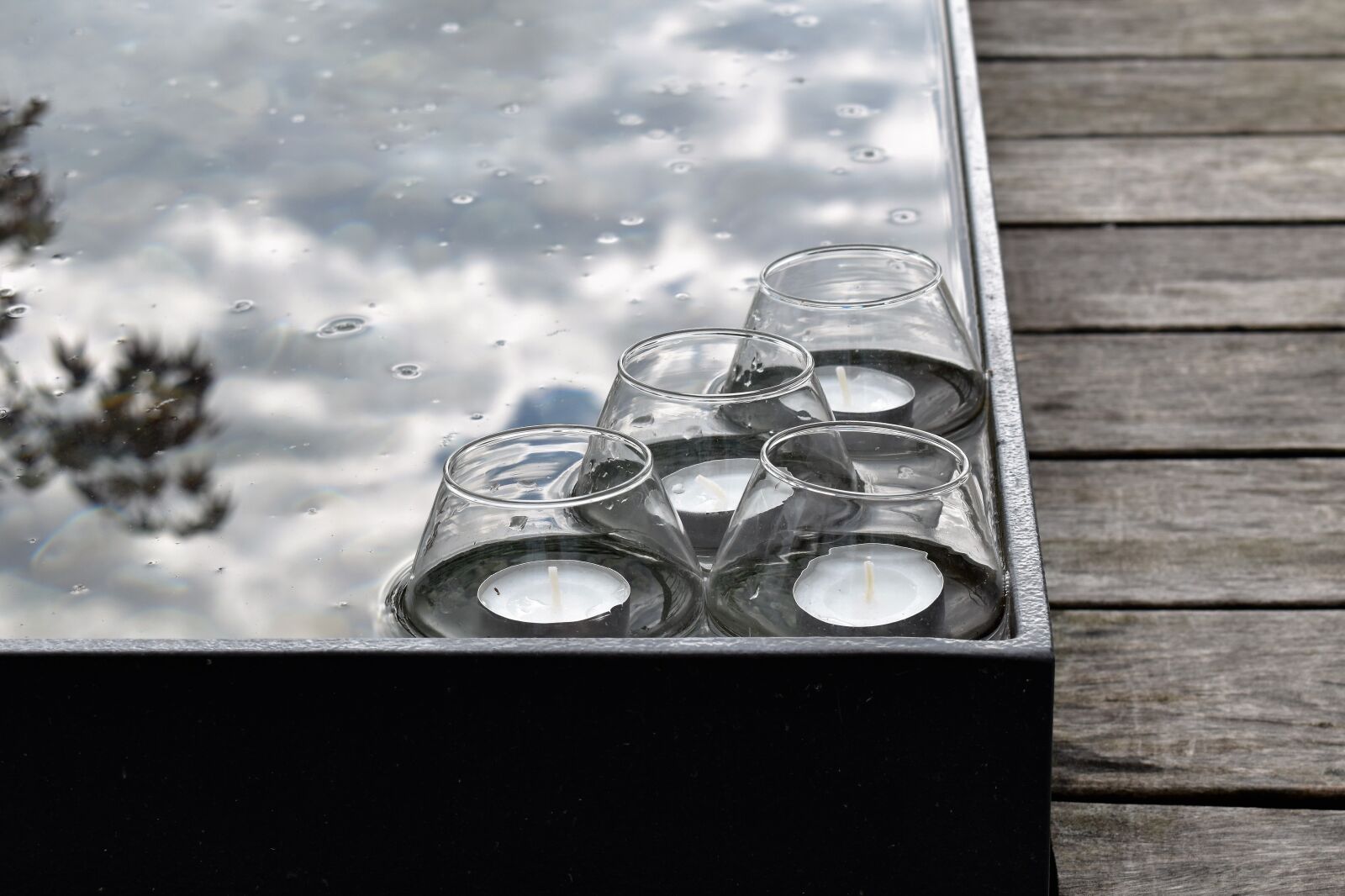 Nikon D5500 sample photo. Floating candles, pond, mirror photography