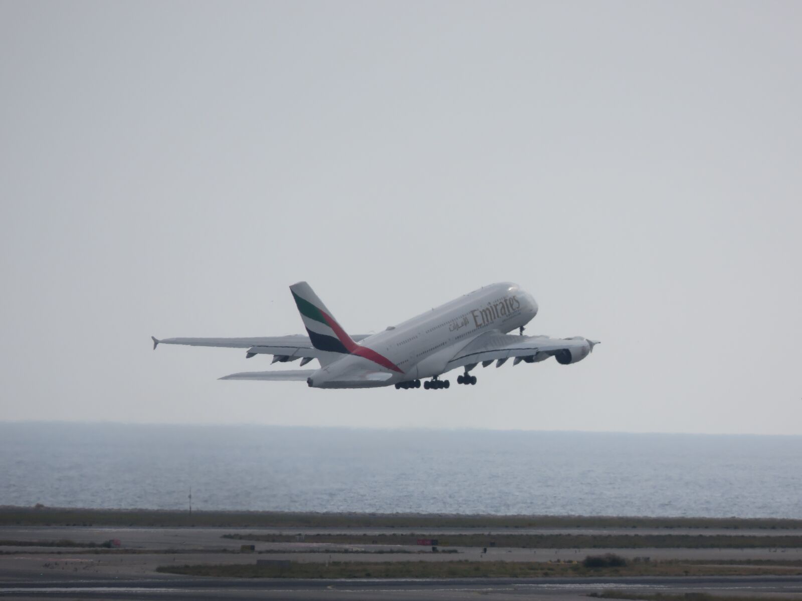 Canon PowerShot SX710 HS sample photo. Aircraft, flight, off photography