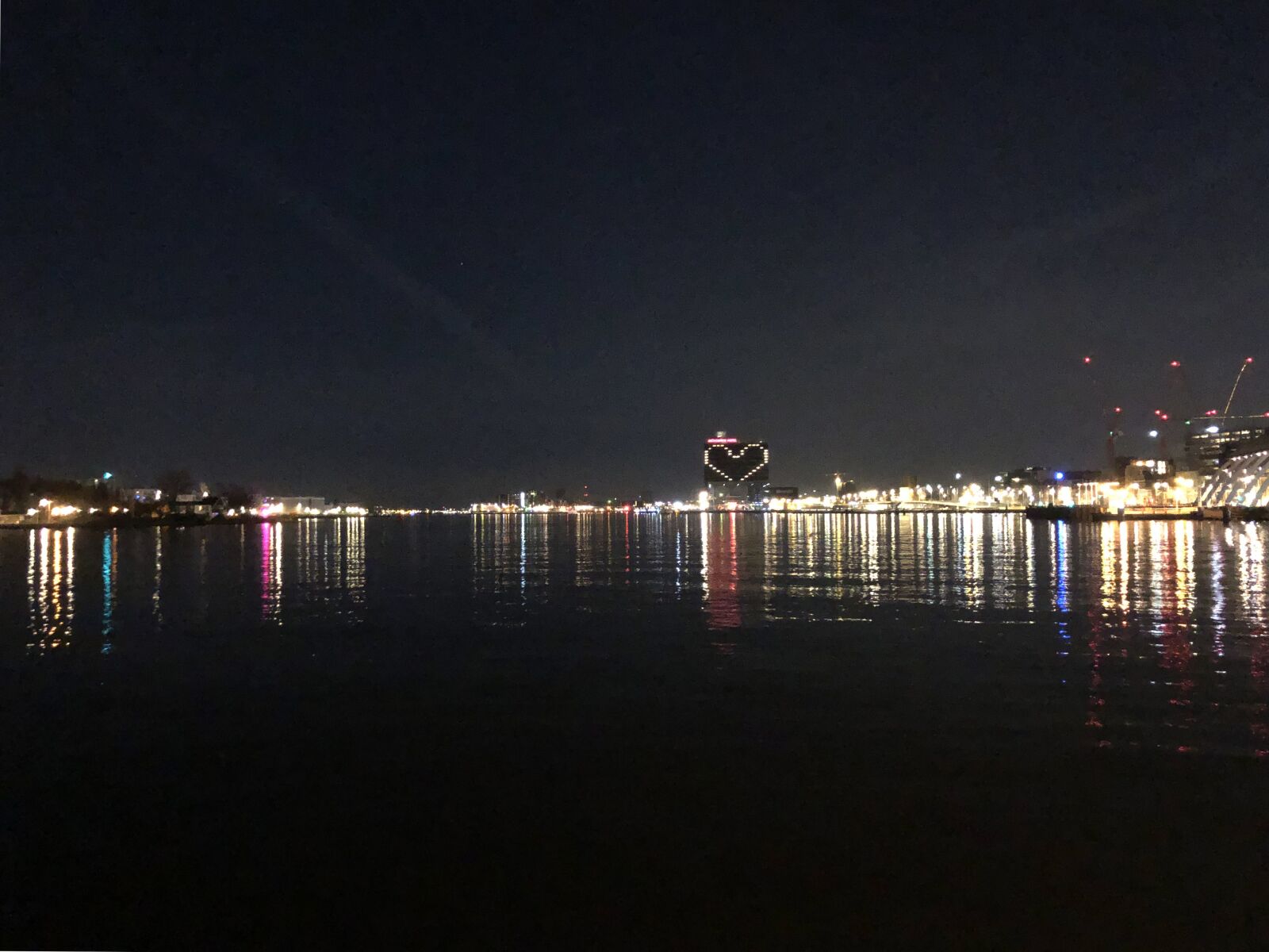 iPhone X back dual camera 4mm f/1.8 sample photo. City at night, amsterdam photography
