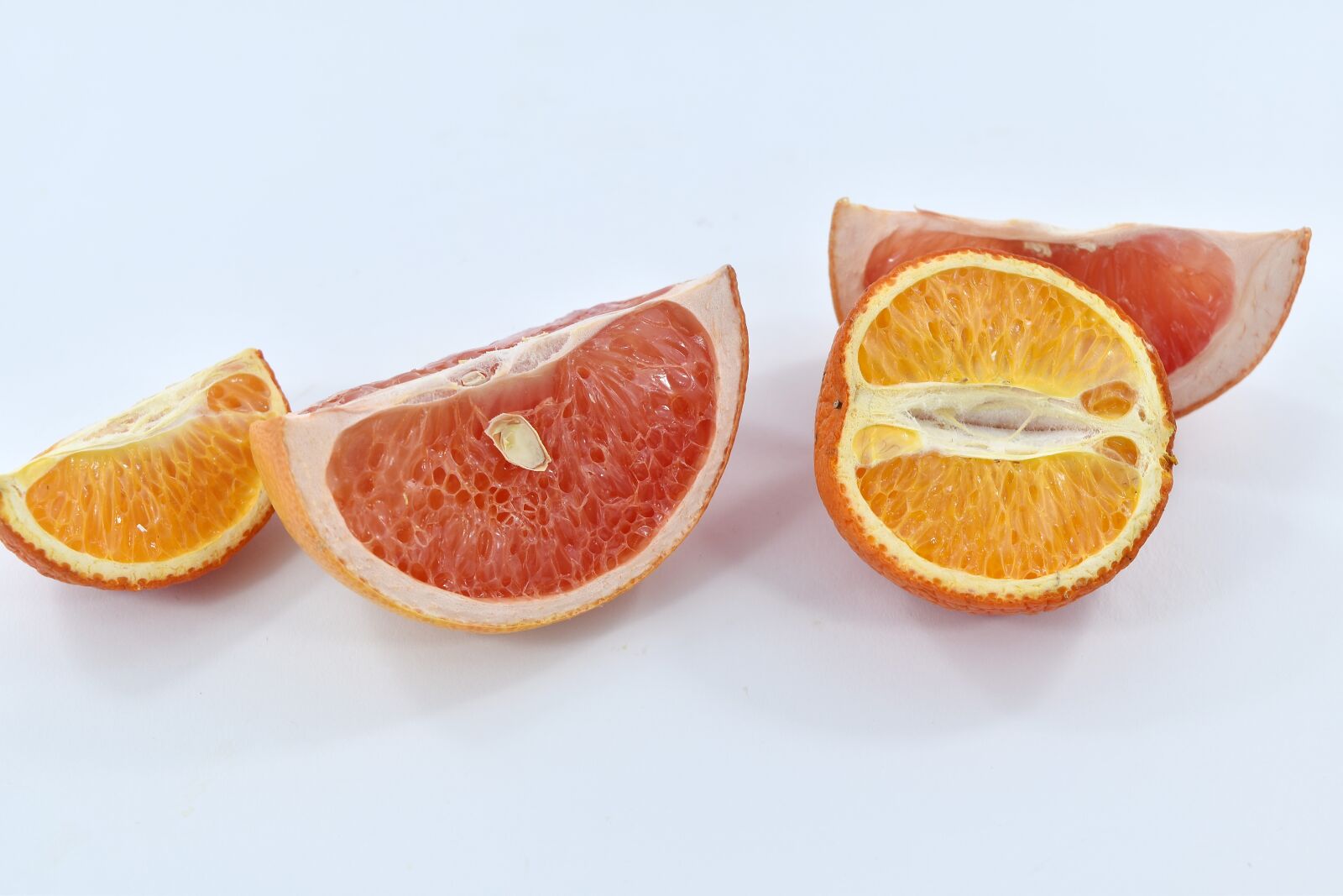 Nikon D5500 sample photo. Grapefruit, half, mandarin, slices photography