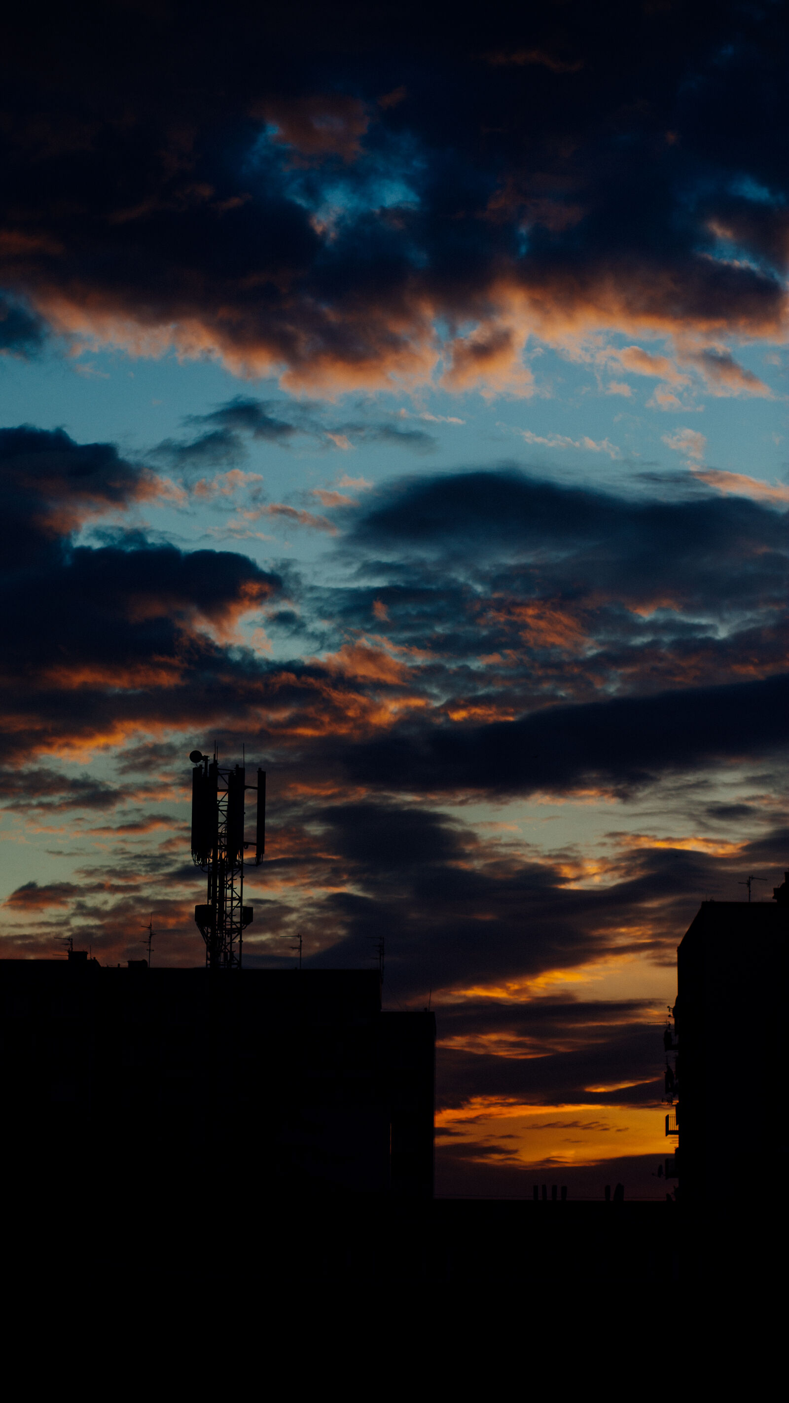 Canon EF 85mm F1.8 USM sample photo. Aerial, blue, building, clouds photography