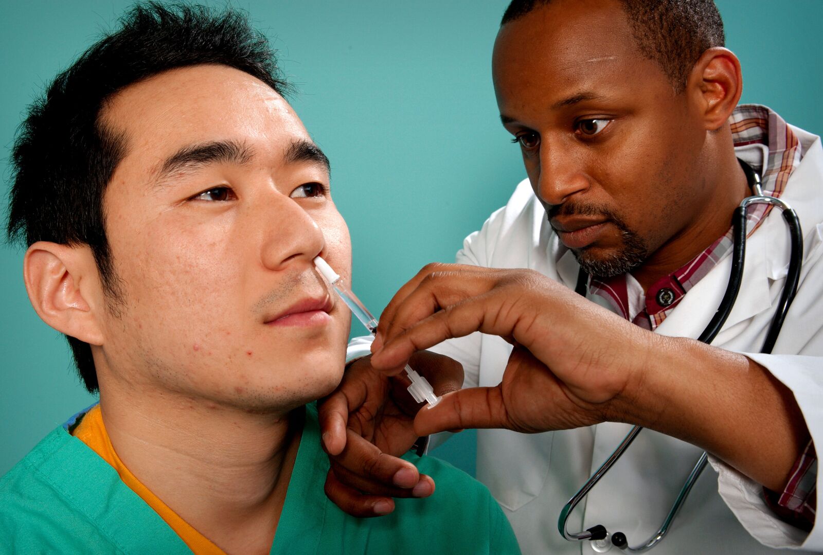 Nikon D3 sample photo. Up-close, face, delivering, vaccine photography