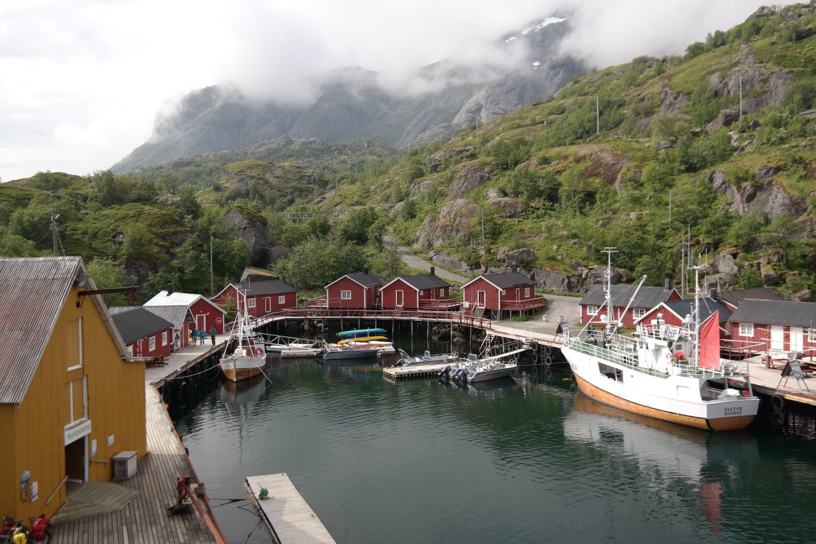 Samsung NX300 sample photo. Port, wooden houses, red photography